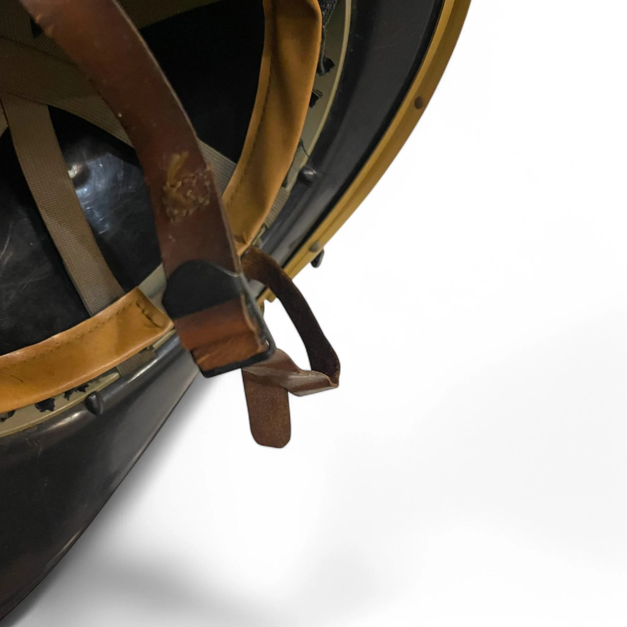 Vintage black firefighter helmet with classic design, an antique fireman collectible perfect for display, gift for fireman memorabilia, or fire department decor.