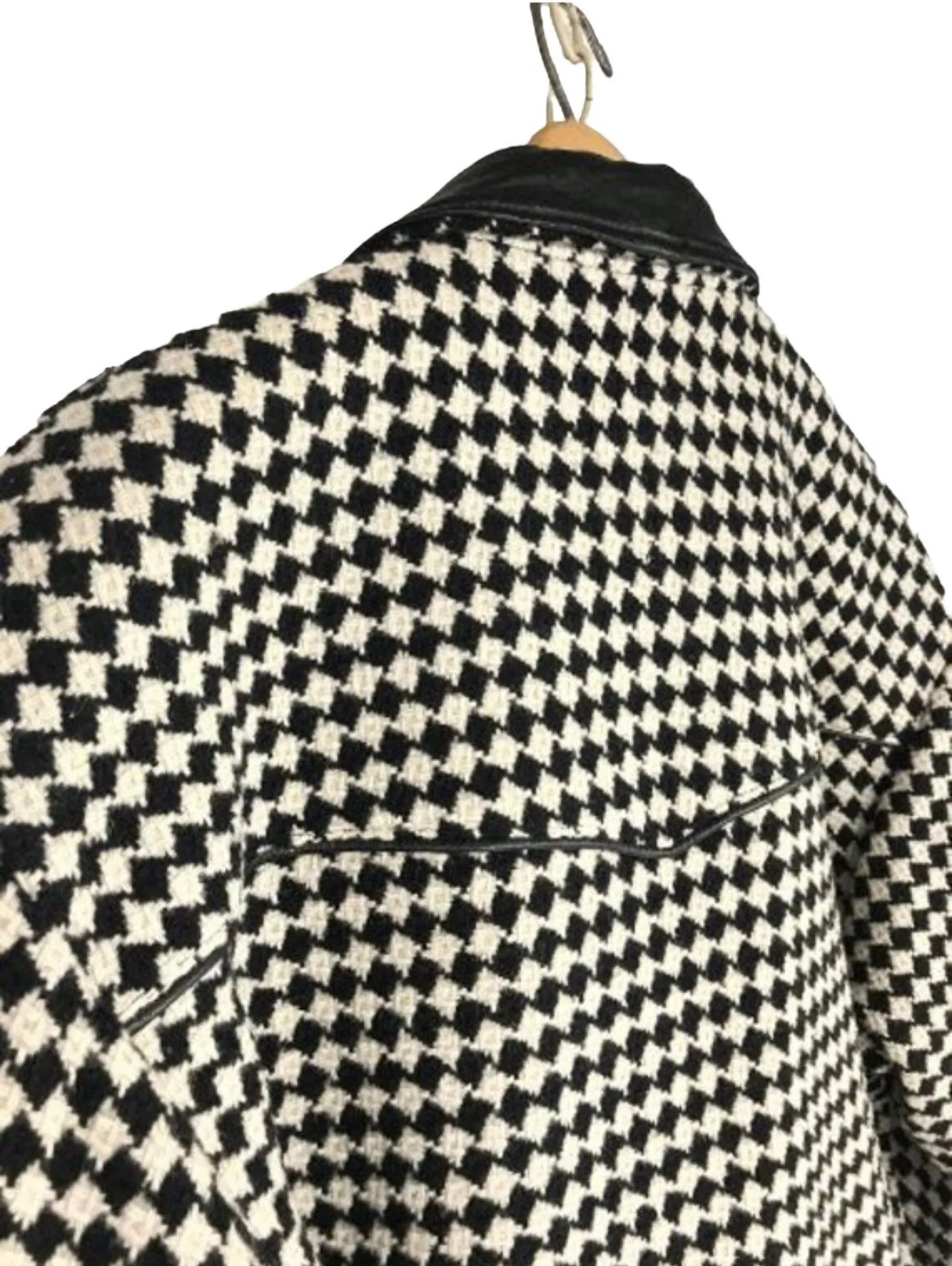 Vintage Pioneer Wear womens size medium black and white houndstooth coat, fully lined, trimmed in black leather, button front closure, two side pockets.