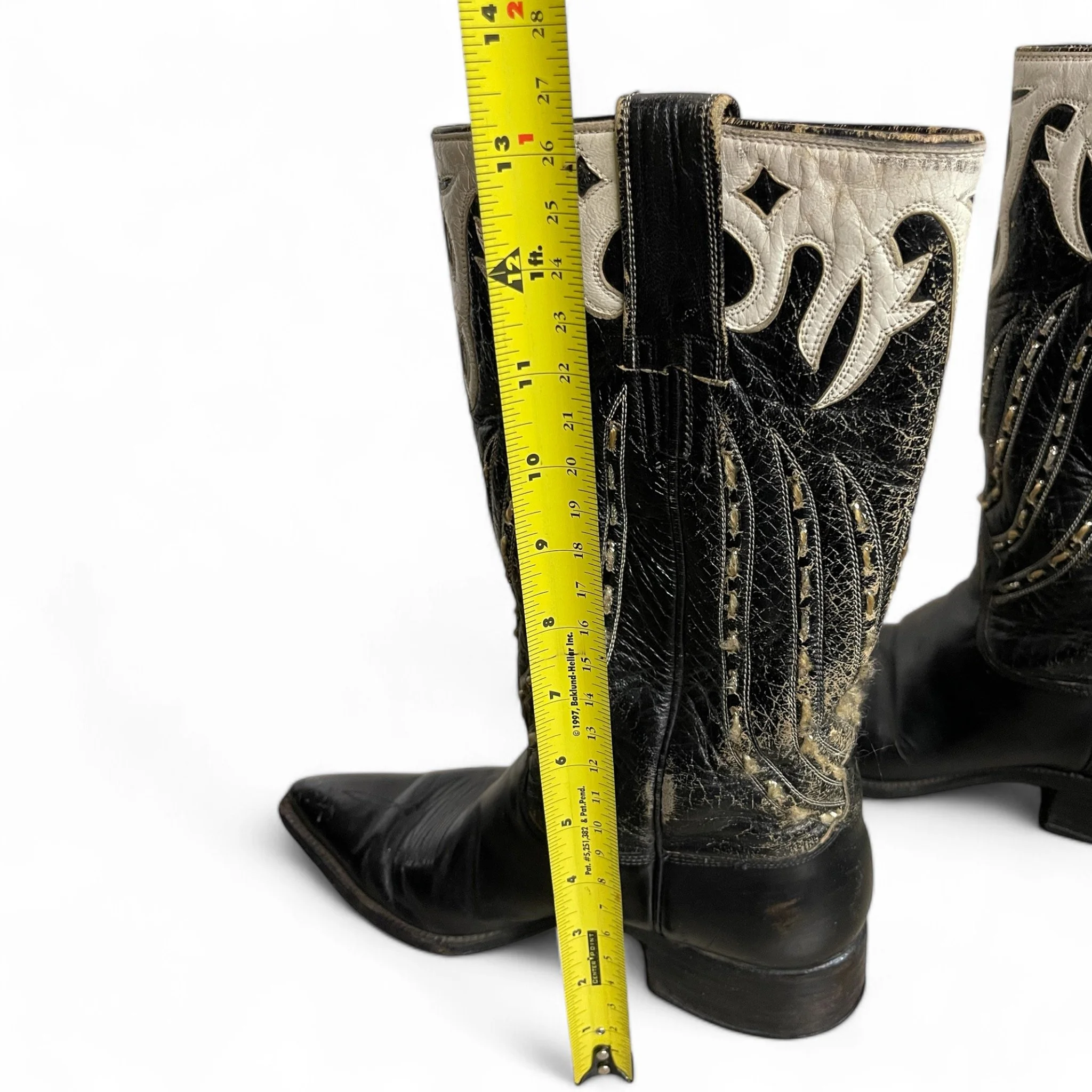 Vintage black leather cowboy boots with ornate white overlay, stovepipe shaft, pointed snip toe, mid shaft, stockman heel, classic dressy western boots.