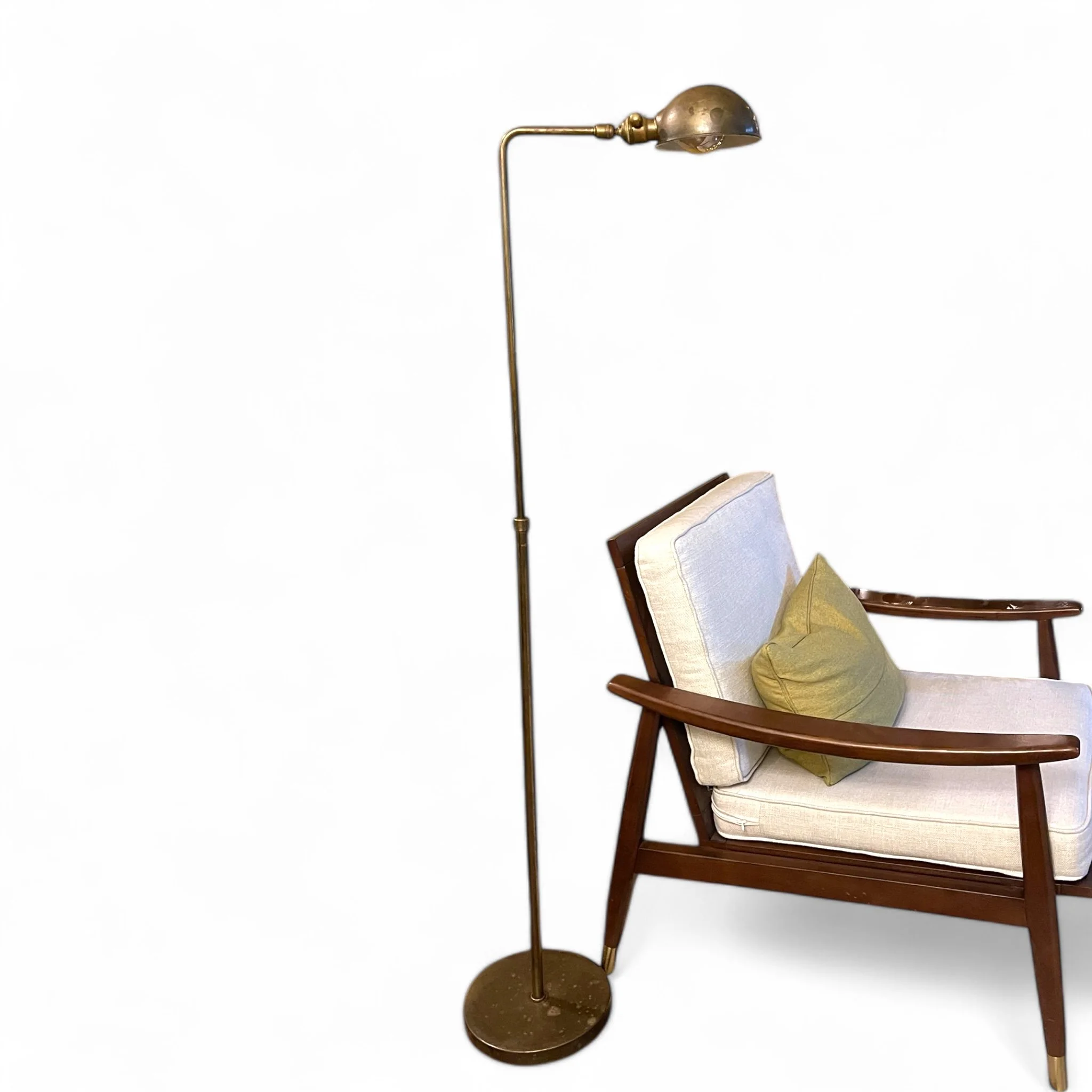 Vintage Chapman style brass pharmacy floor lamp, height fully adjustable, articulating round shade, round weighted base, circa 1960s.