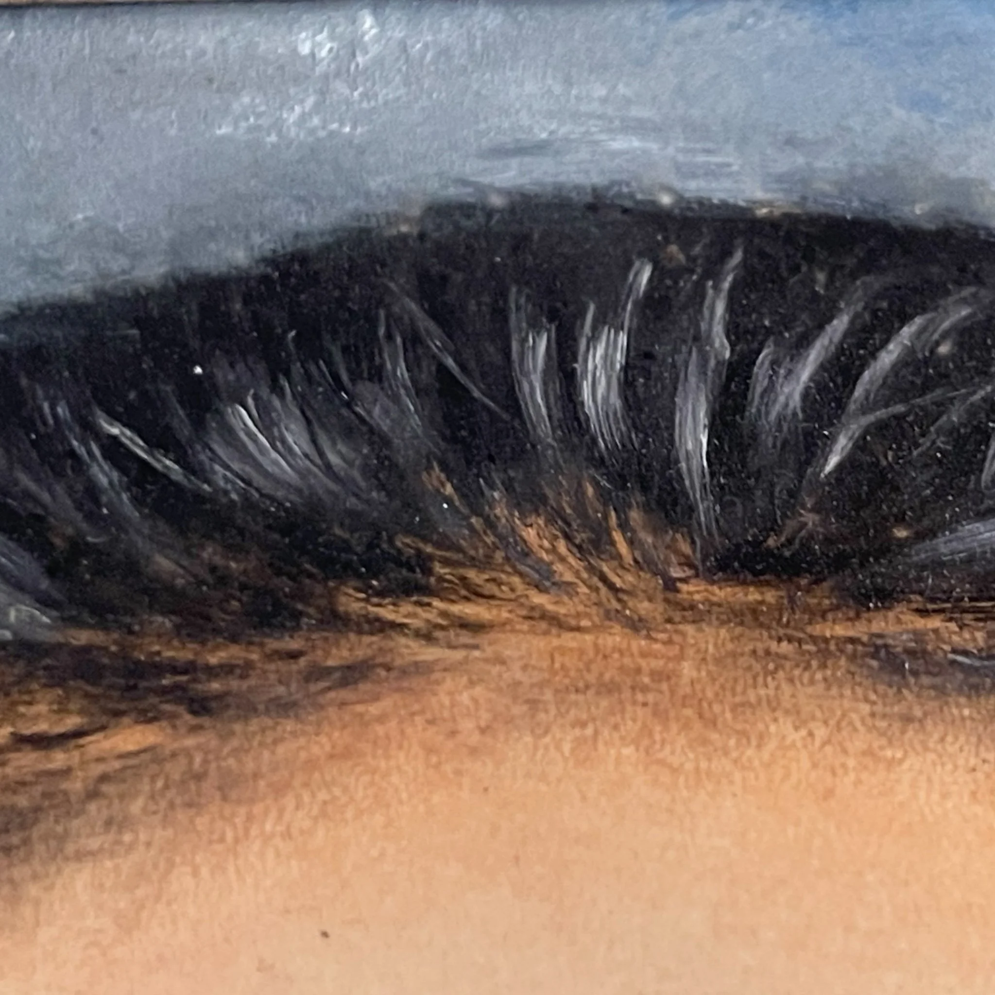 Close up brushstrokes on a vintage original portrait painting of a Hispanic woman with a stoic expression in a blue dress, wearing jewelry, housed in a gold ornate wooden frame.