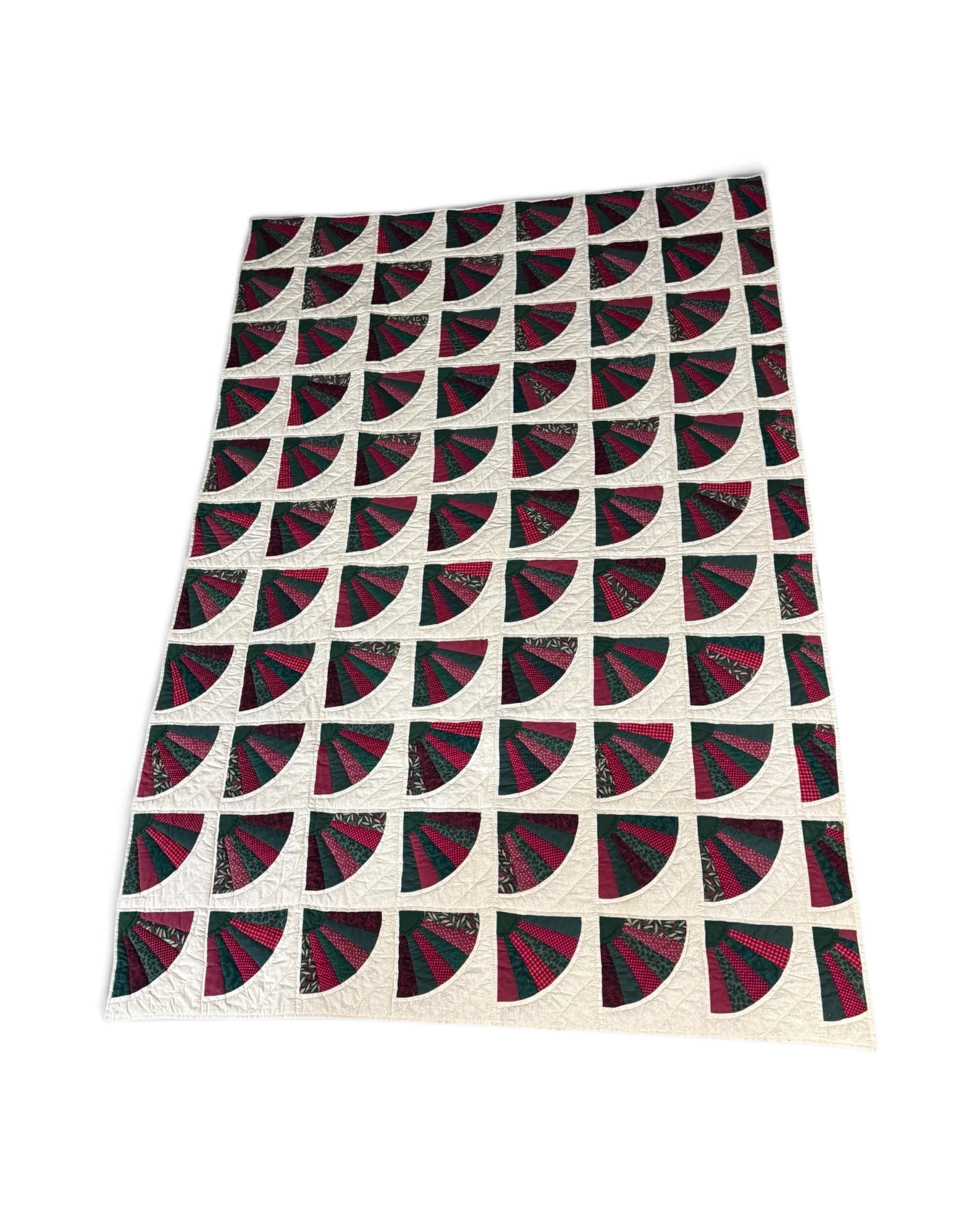 full size view of XL twin vintage handmade quilt in a burgundy, forest green, red, and light beige Grandmother's fan pattern.