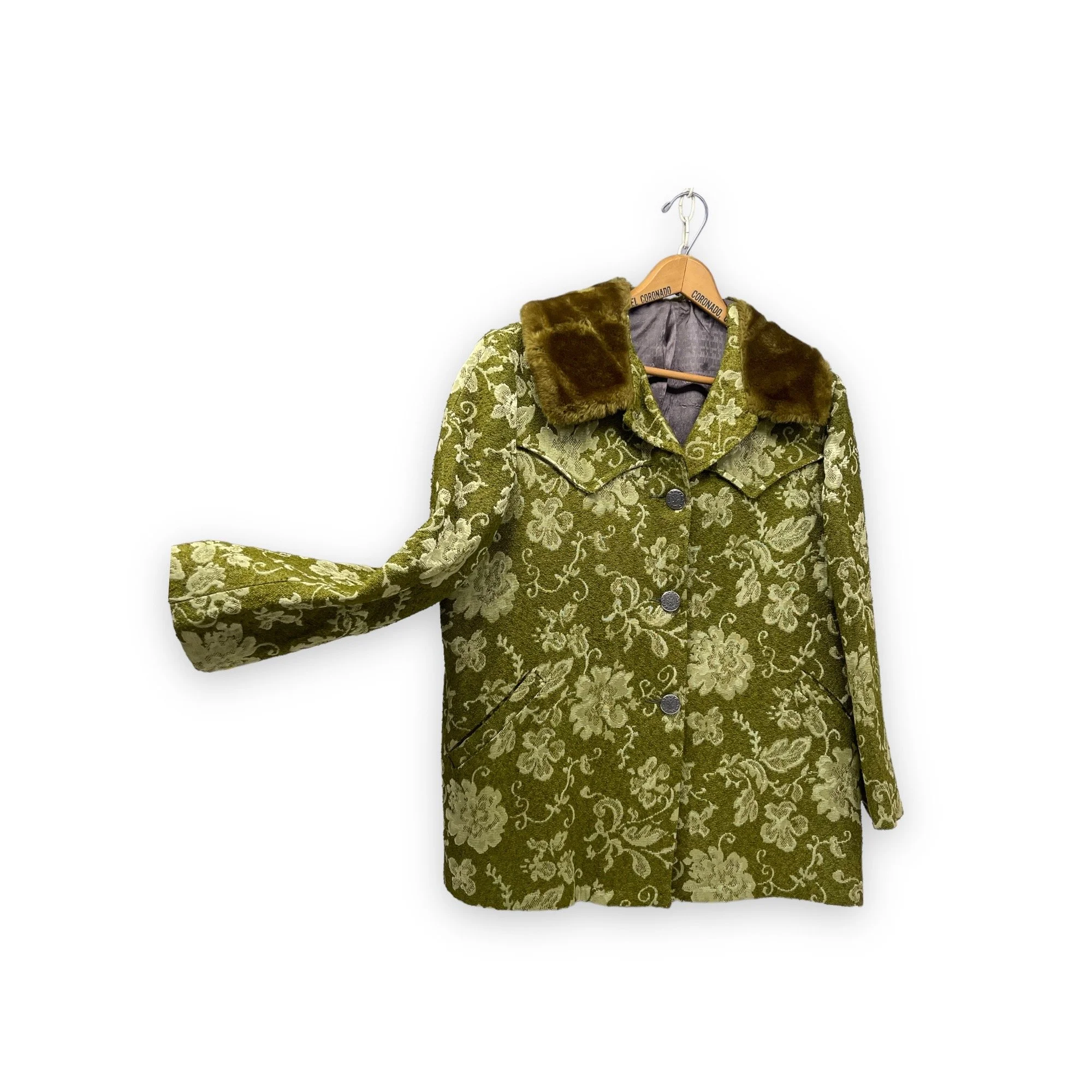 Vintage 1960s women's Westwear jacket in green floral tapestry, classic ranch style with button front closure, fully lined, front pockets, and western yoke detailing.