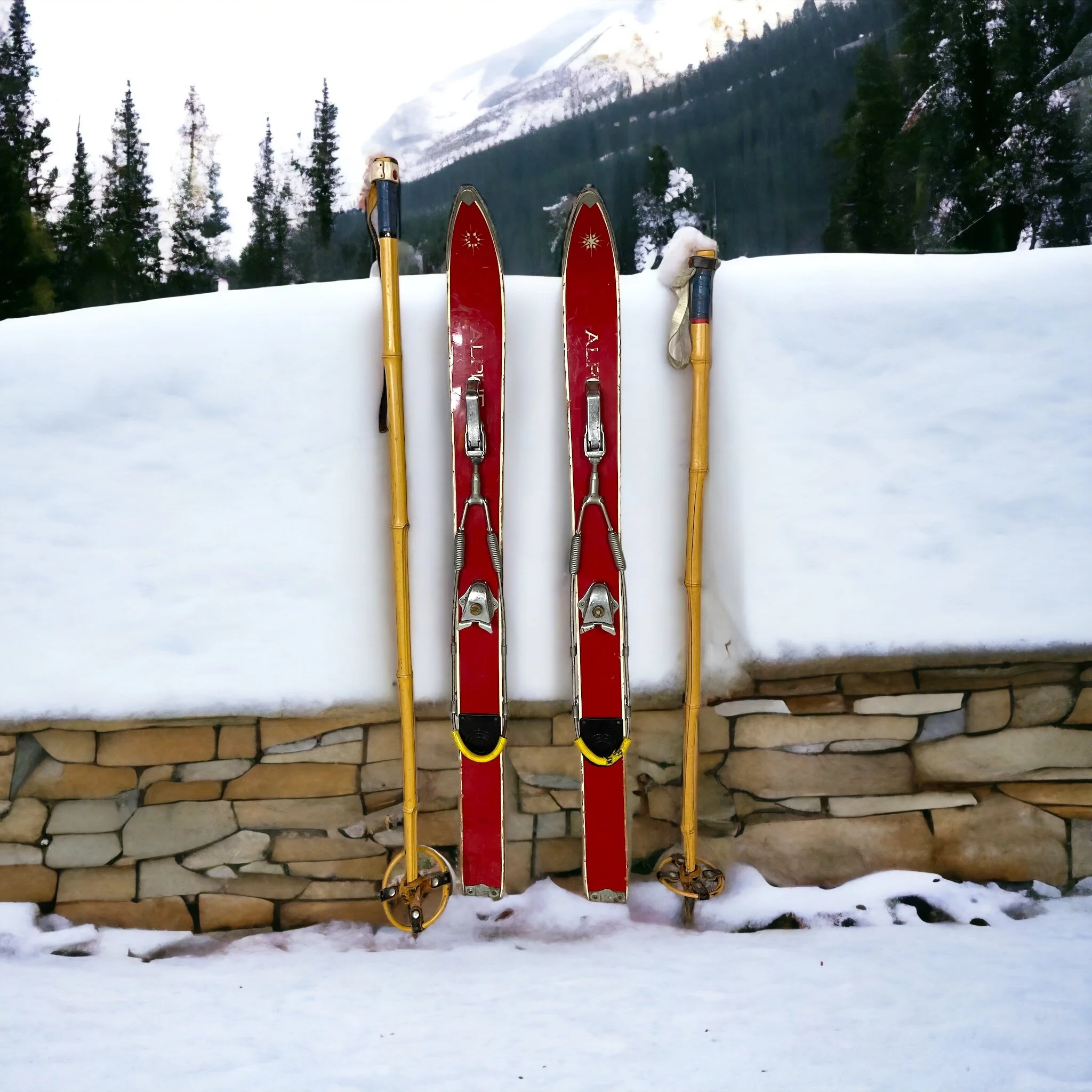 Pair of vintage red kids snow skis with metal bindings and bamboo ski poles, perfect for winter cabin or lodge decor.