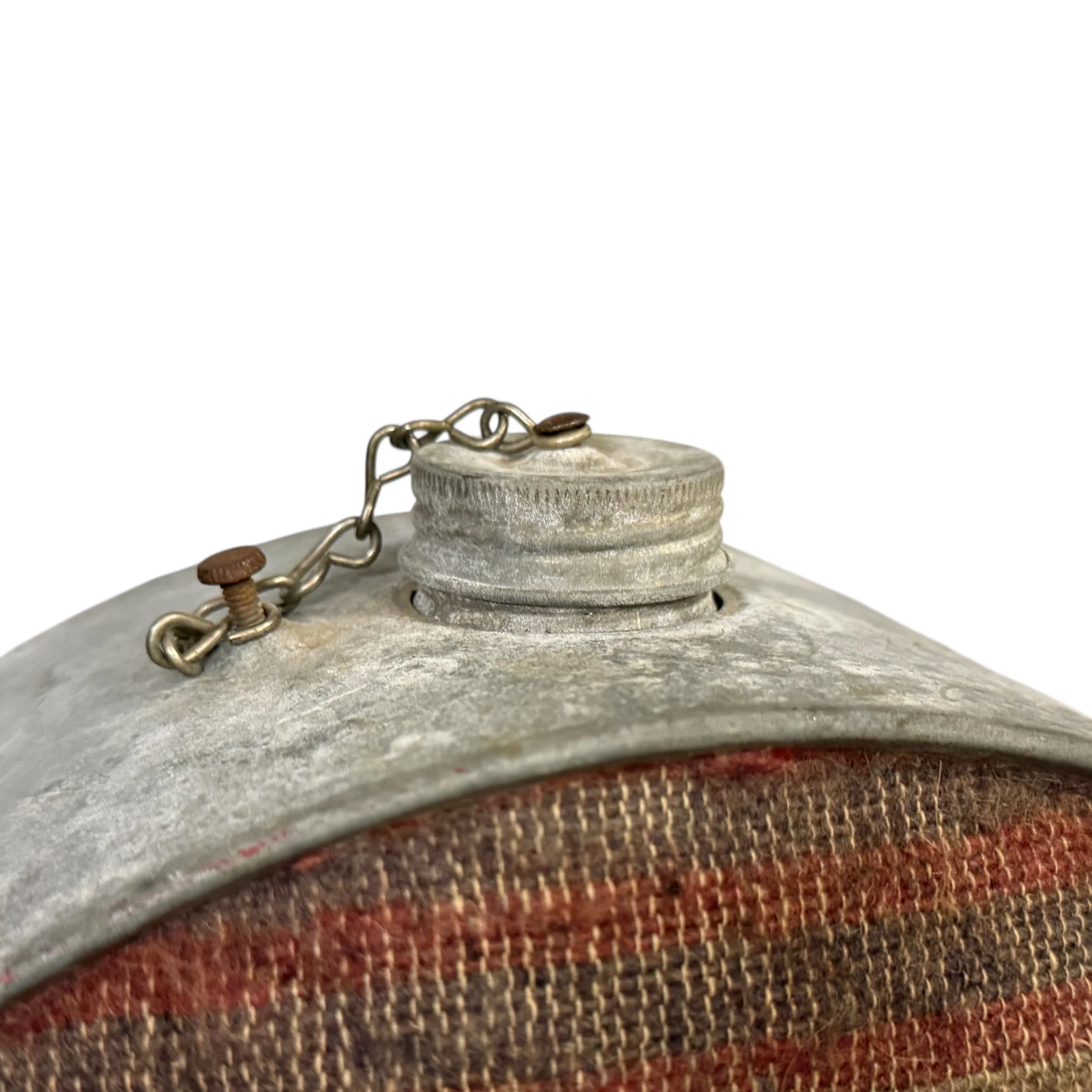 Close up view of the lid and chain on a blanket Oasis canteen