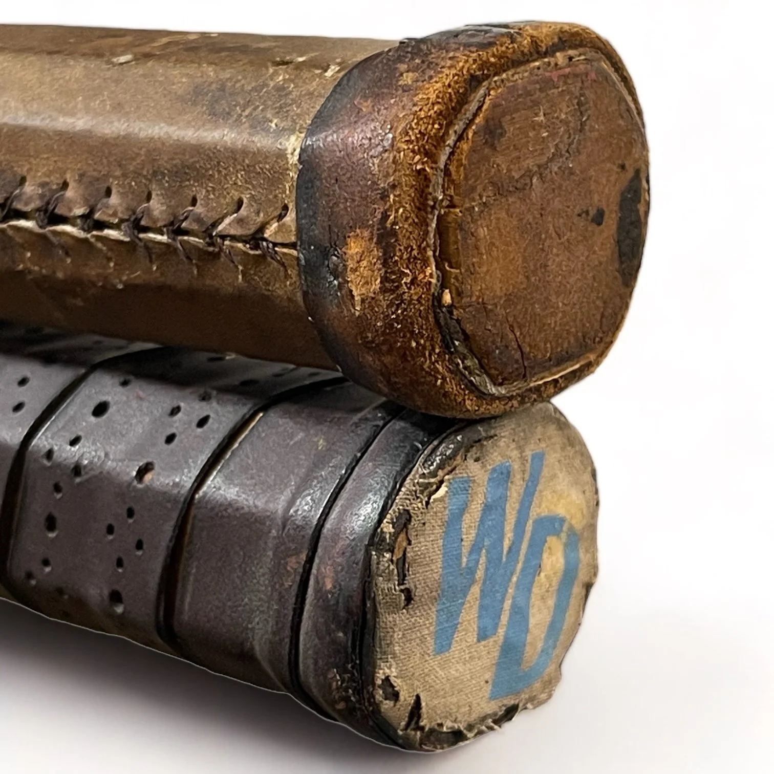 Vintage pair of wooden tennis rackets by Wright & Ditson and Playrite with wood press and canvas covers.