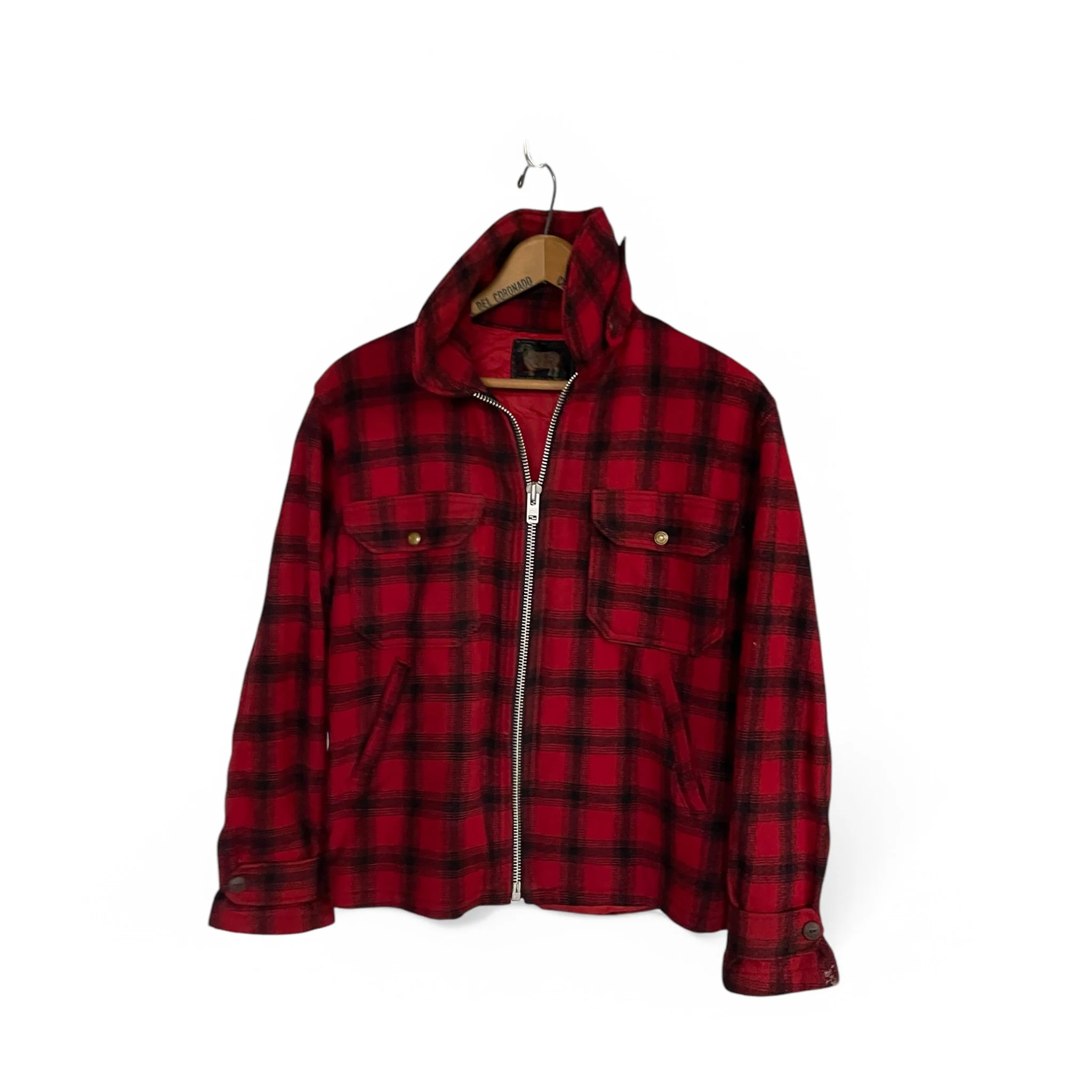 Vintage Woolrich black red plaid wool zip up jacket, fully lined, front pockets, game pocket in back, size 42. Rugged outerwear for the hunting.