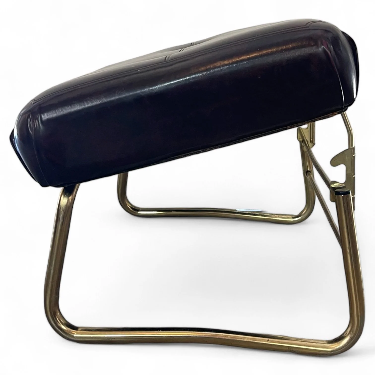 Vintage 1960s mid century adjustable Pearl Wick Leg Lounger footstool ottoman in a dark brown vinyl upholstered top with gold metal legs. Made in USA.