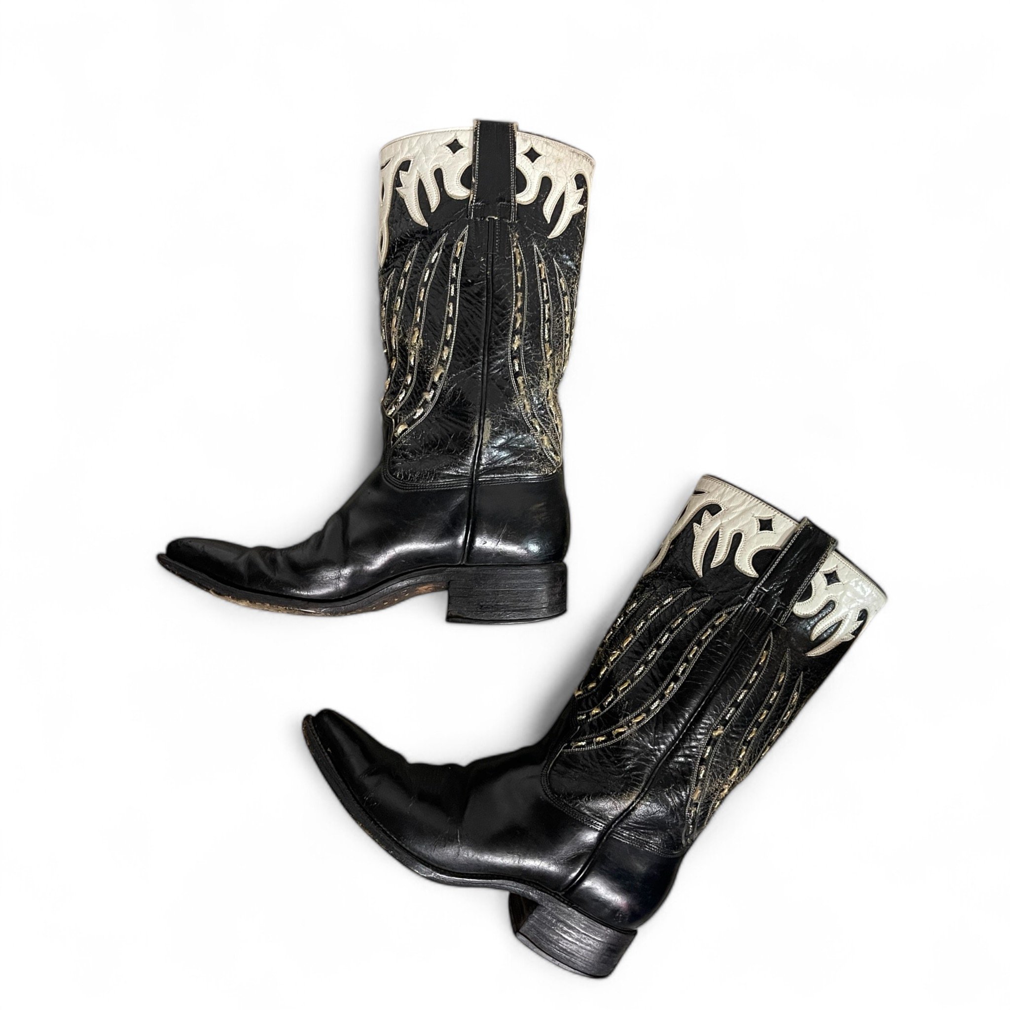 Vintage black leather cowboy boots with ornate white overlay, stovepipe shaft, pointed snip toe, mid shaft, stockman heel, classic dressy western boots.