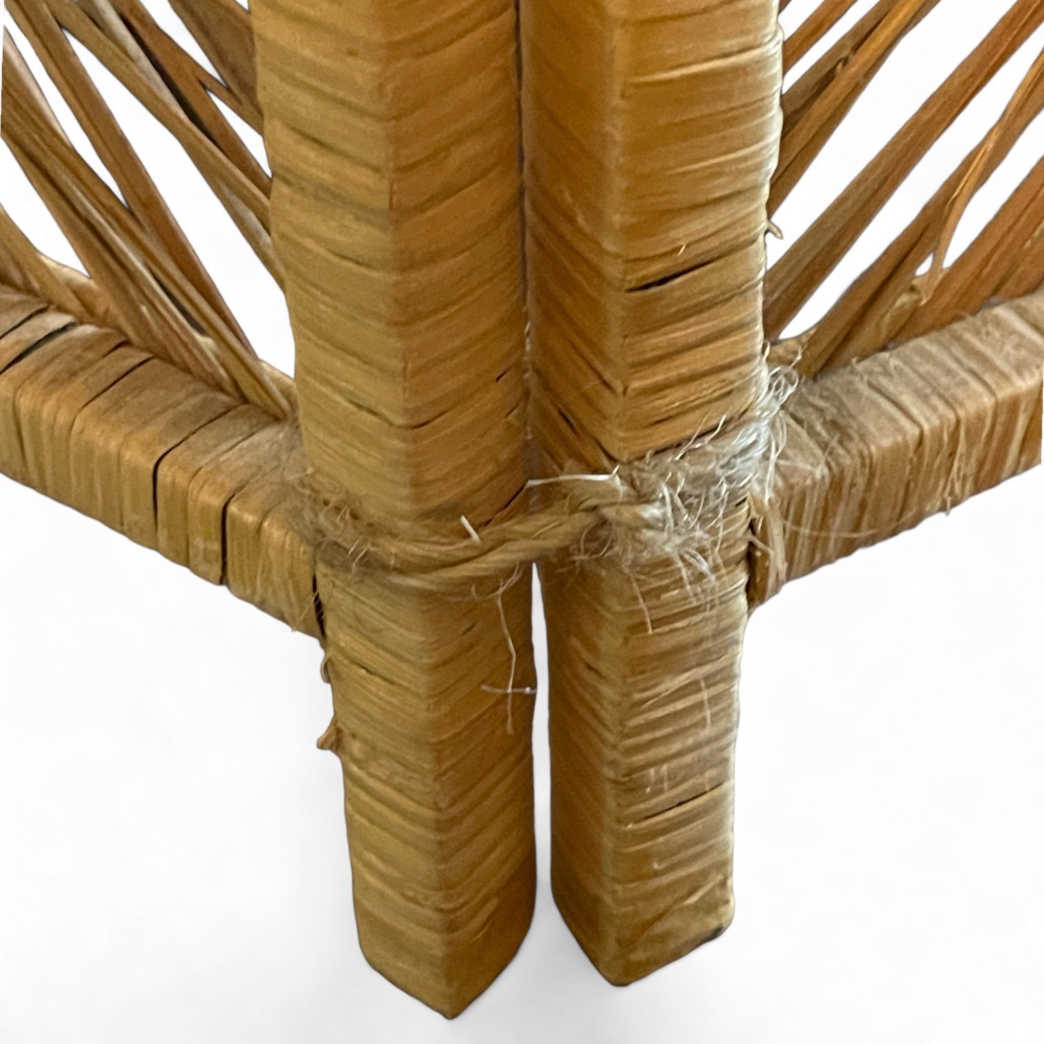 Vintage 1970s rattan room divider with sunburst pattern and rounded tops. Measures 71.5 inches tall