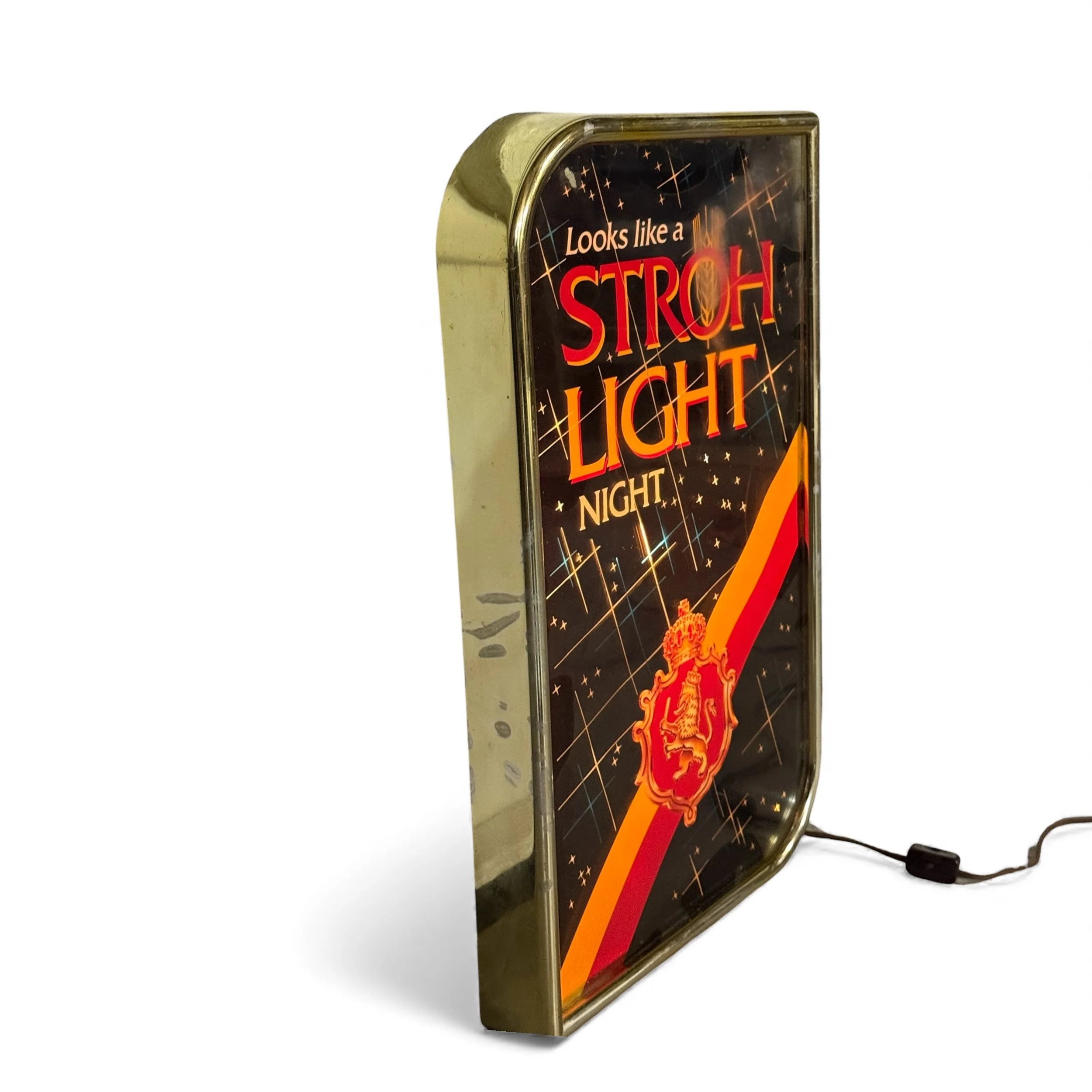 Side view of vintage Stroh Light illuminated beer sign, gold frame, black, red, orange colors shown lit up