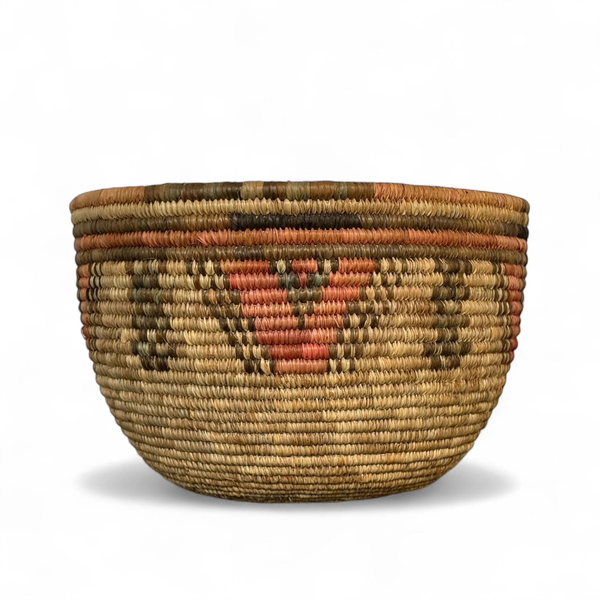 Large vintage Southwestern woven coil basket with bold geometric pattern. Perfect for rustic boho shelf styling or storage.