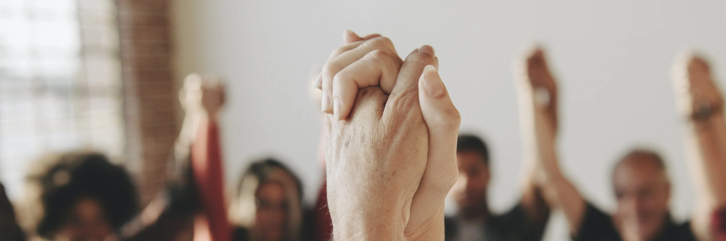 group-of-diverse-people-holding-hands-up-in-the-ai-2021-09-02-06-43-24-utc.jpg