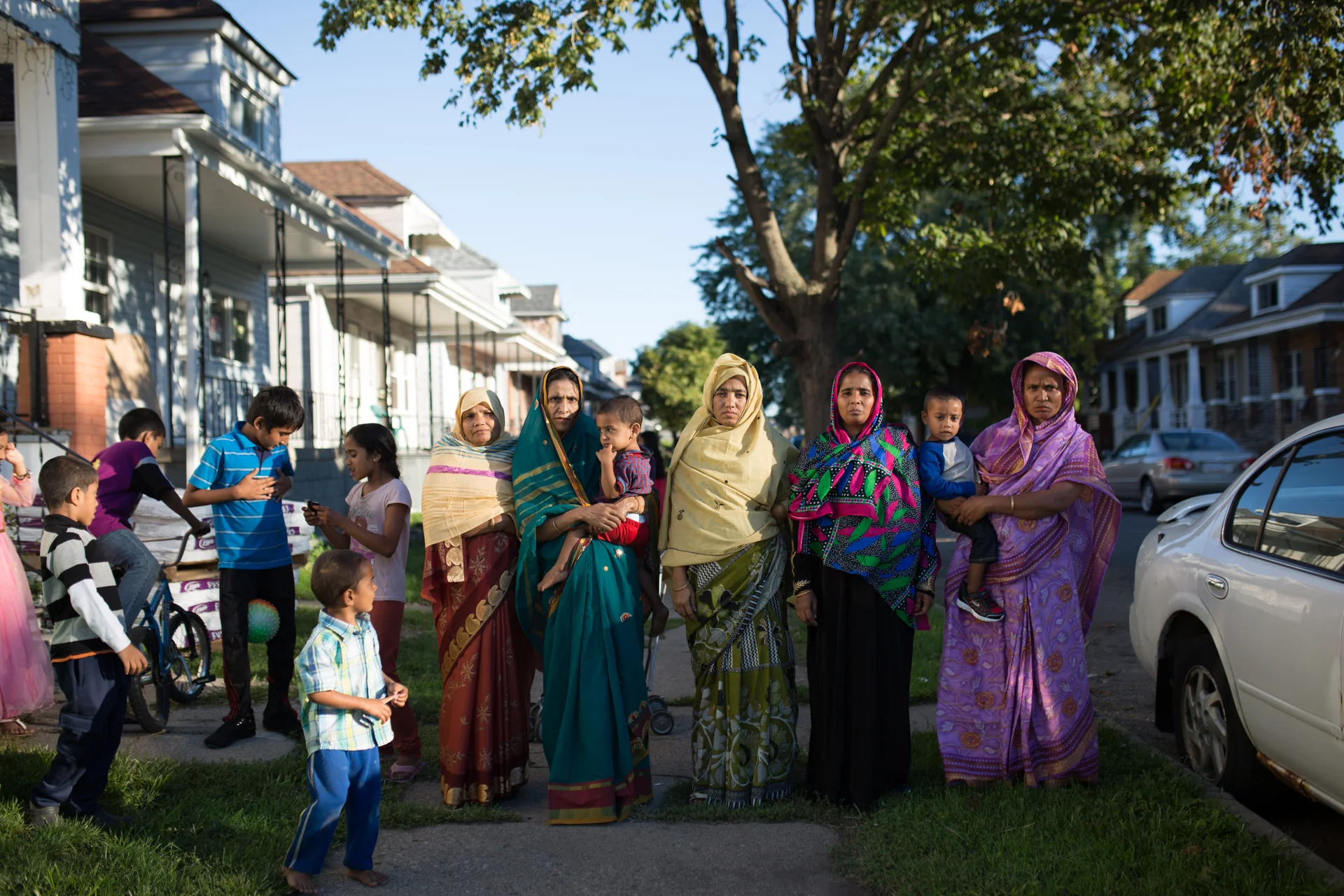 A group of women pose for a portrait outside of there homes on Eid in Detroit, Michigan.