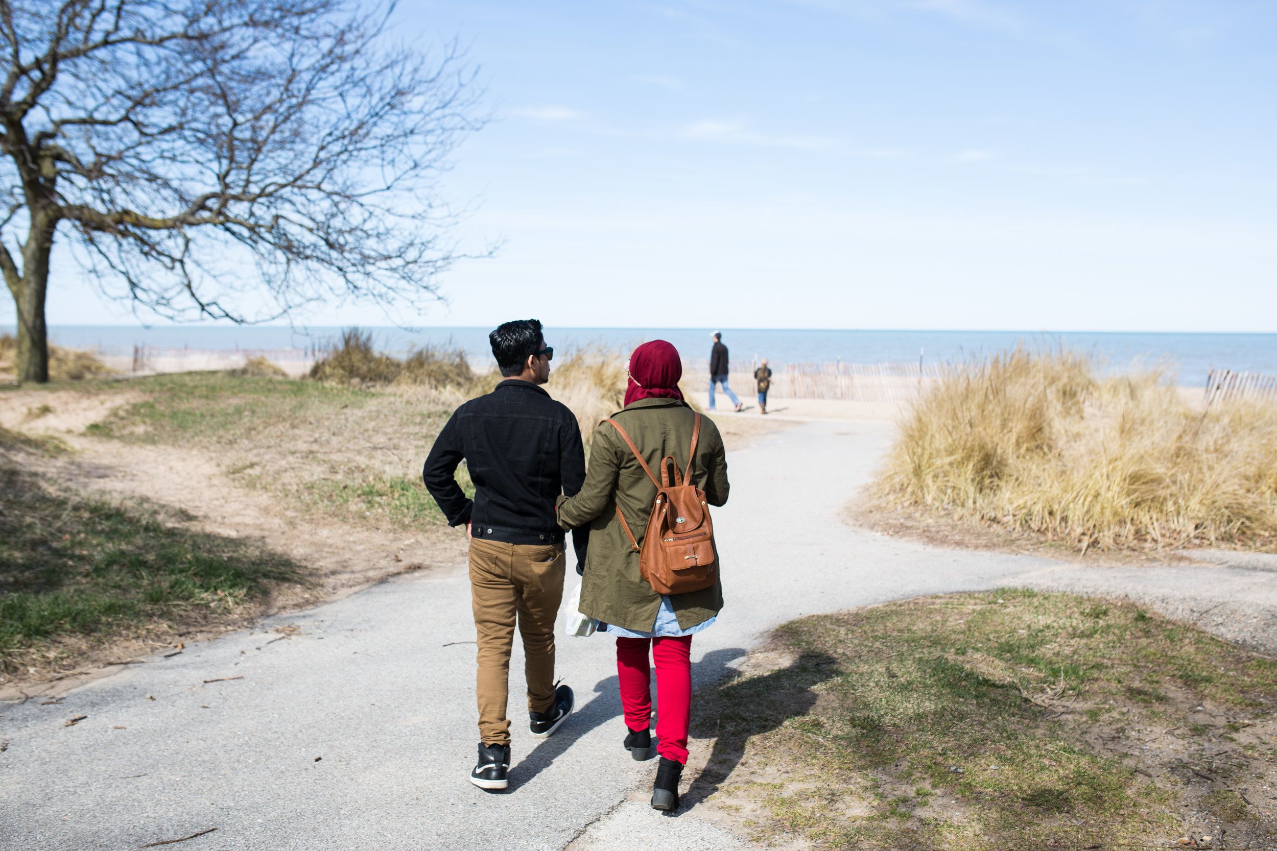 Abdul Samad with his wife, Bibi, 18, on Lake Michigan. They met in the United States in 2016.