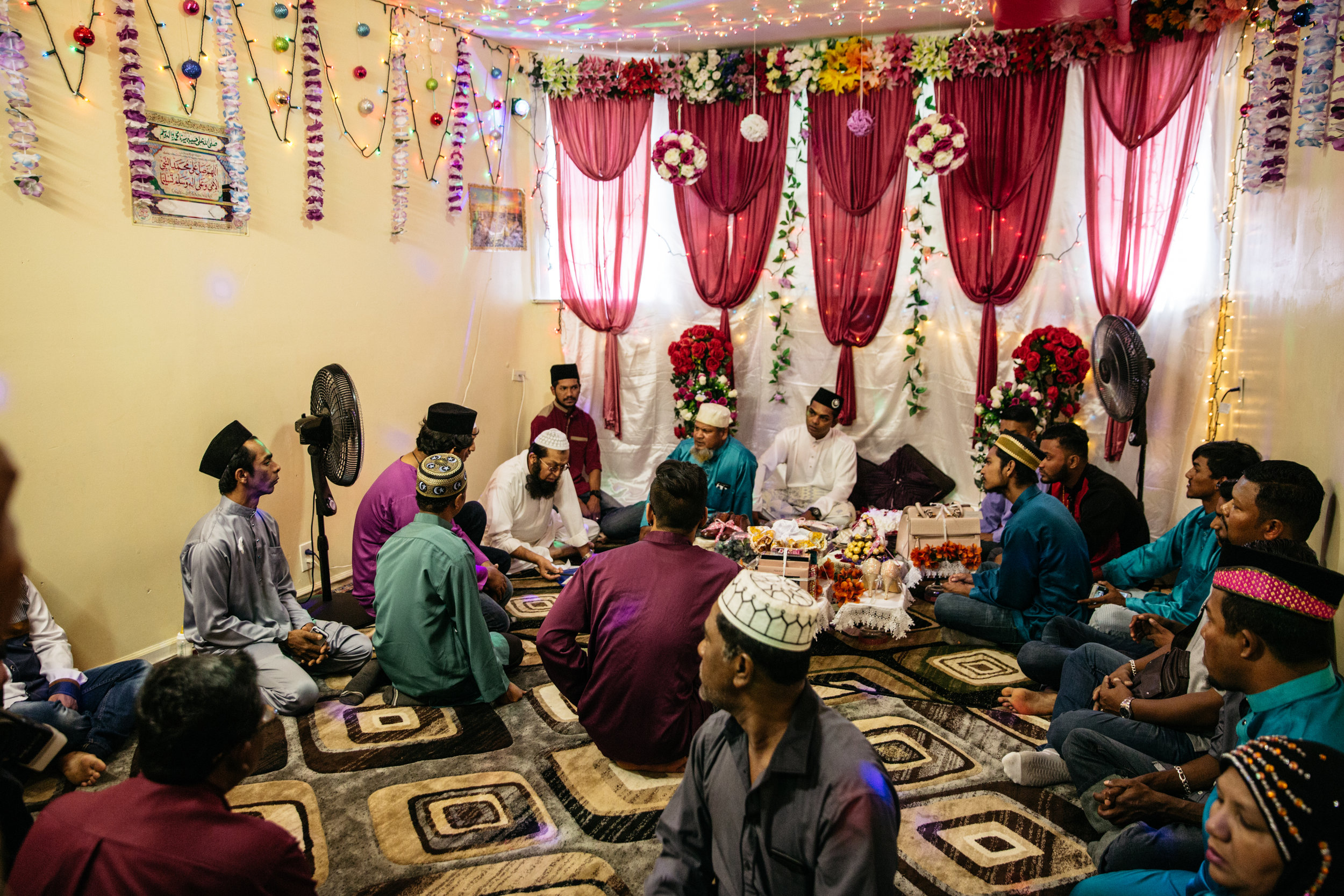 The signing of a marriage contract during a wedding in Rogers Park.