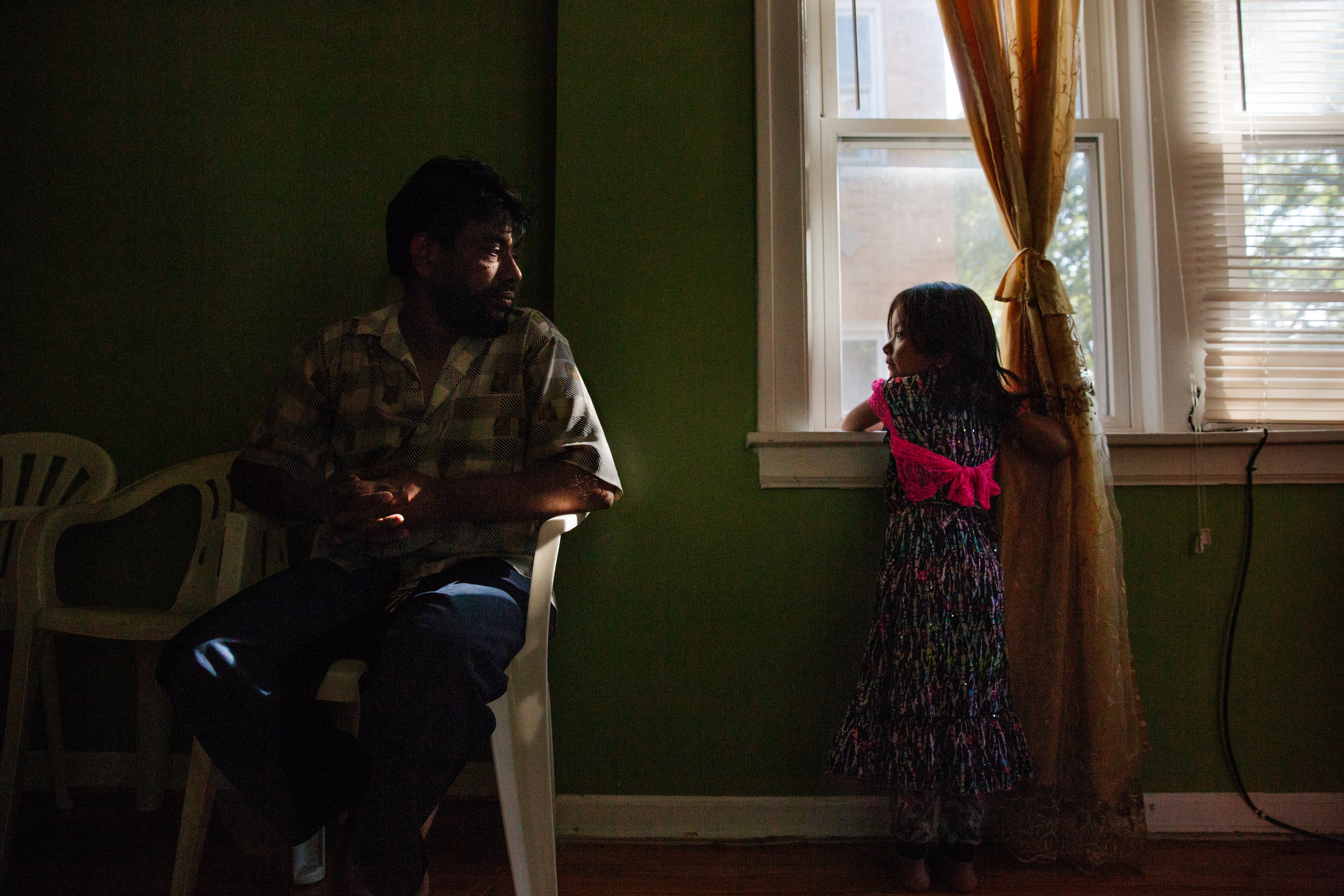  Abdul Aziz, 39, at home in Rogers Park, with his daughter, Arina, 4. As a teenager, he left his family in Myanmar’s Rakhine State, where the Rohingya are concentrated, to find safety in Malaysia. 