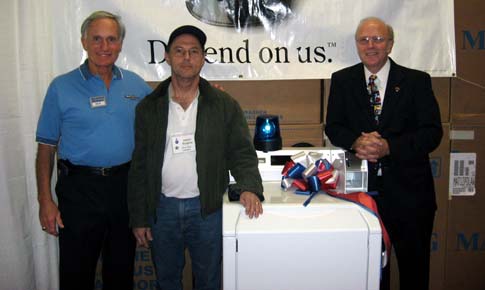 High-Efficiency Washer Winner, James Hedden (Left to right: Richard LaMaina, James Hedden and Dennis W. Waters)