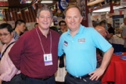 Equipment Marketers Sales Manager Larry LaMaina chats with one of the many exhibitors at the trade show