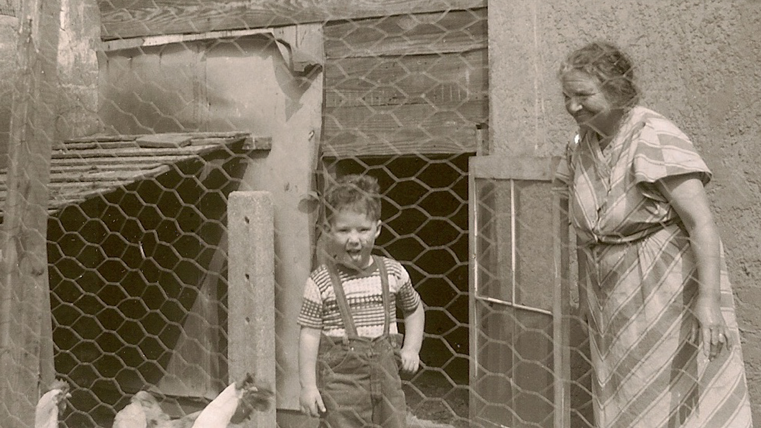 My Grandmother and My Brother In The Backyard Of Beach 15th Street. Apx 1951. Yes- She Had A Chicken Coop!
