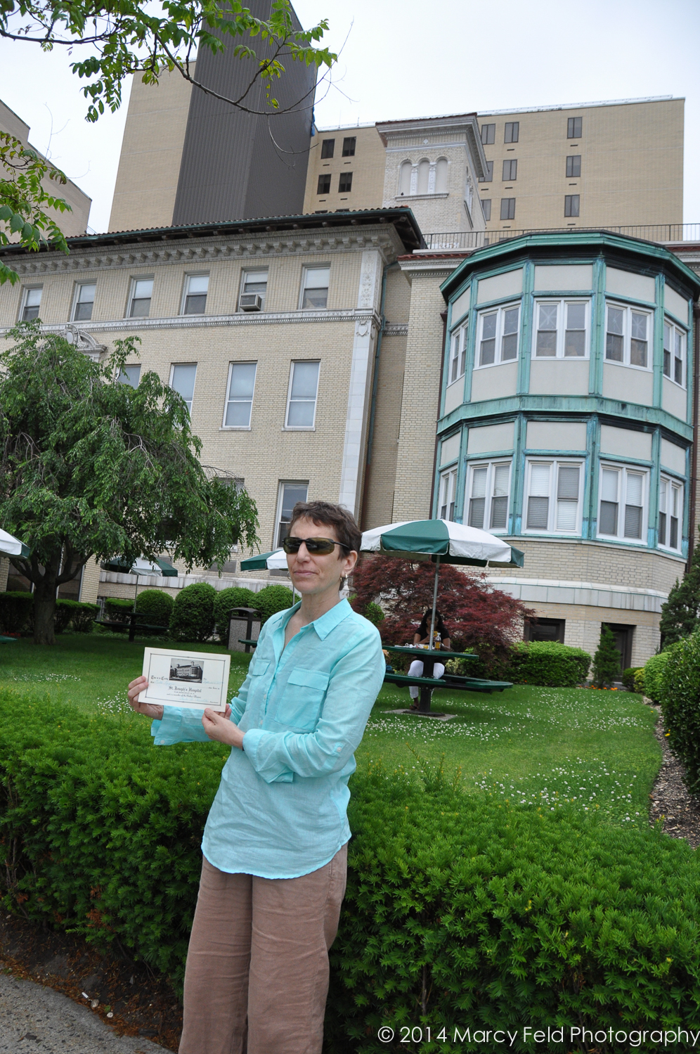 My Friend Ruth In Front of St. John's Episcopal Hospital (Formerly St. Joseph' s Hospital, Where We Were Both Born .