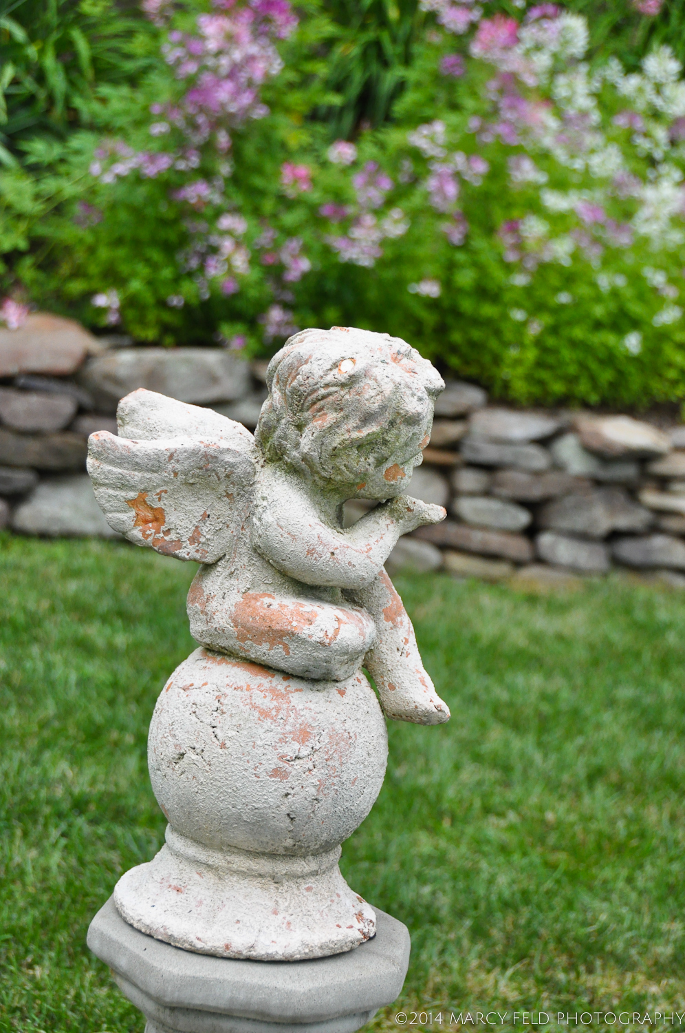 Sweet little cherub which was the first purchase after the pool installation
