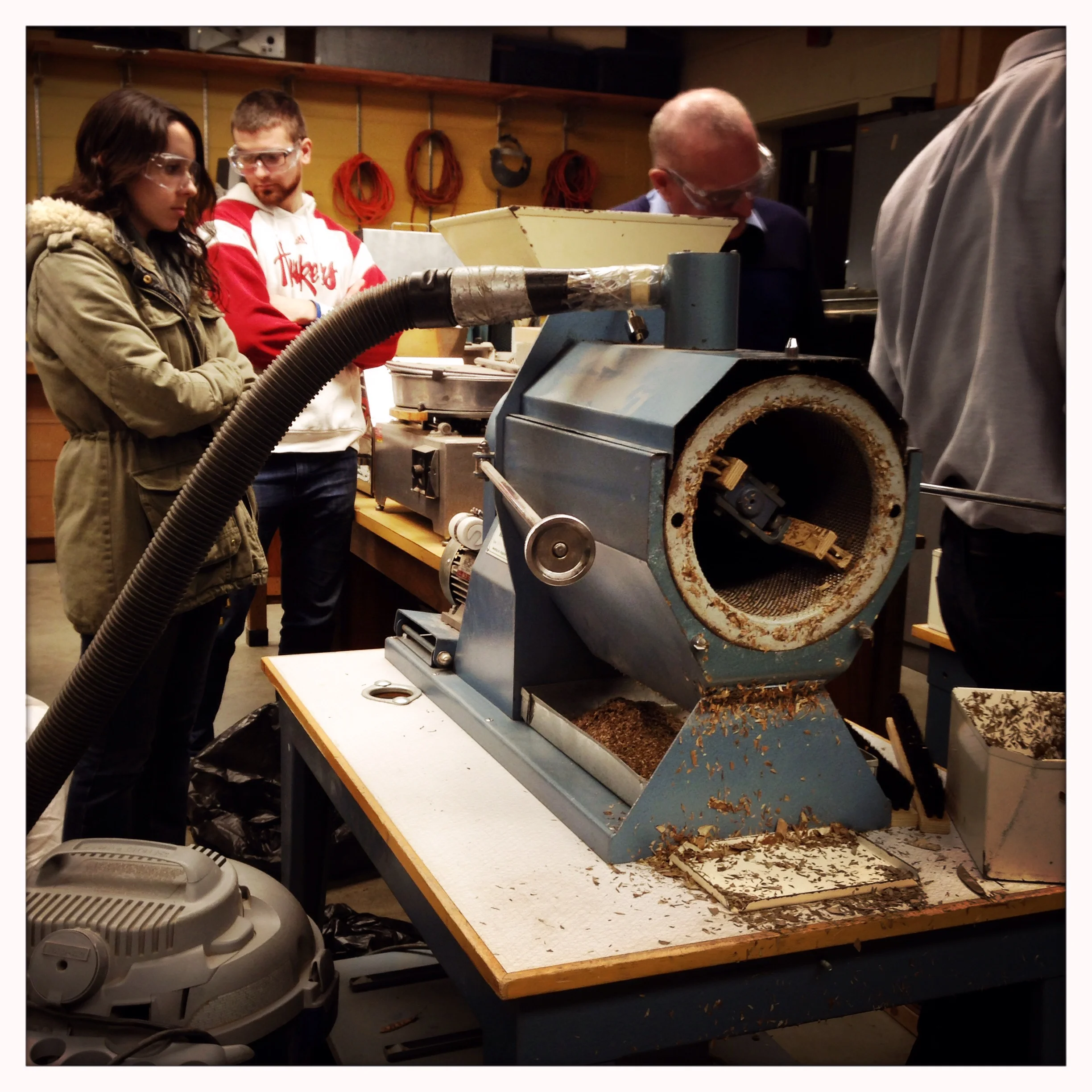 Step 2: A Brushing machine collects (mostly) seed on a wire mesh cylinder after threshing seeds form their pods.