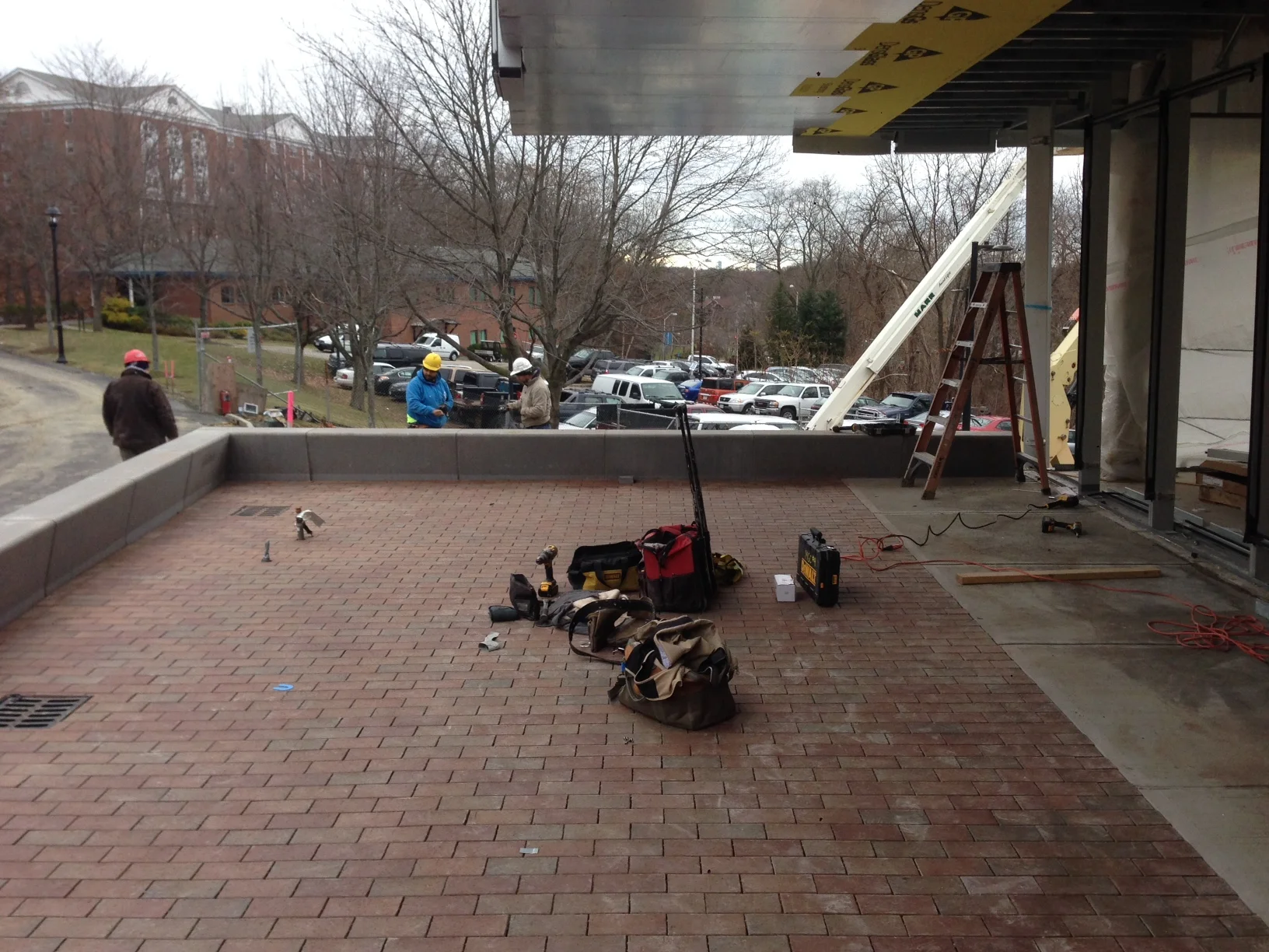 This flexible gathering space is surrounded by the precast concrete seatwall.