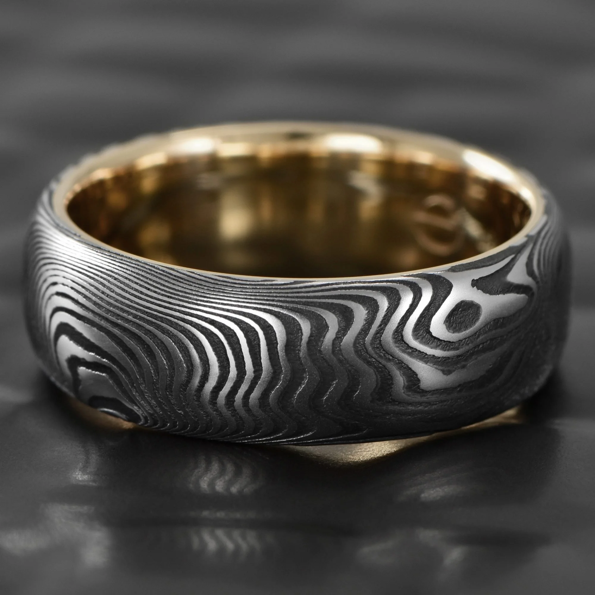 Domed-Old-Growth-Damascus-Steel-Wedding-Ring-Comfort-Fit-Gold-Sleeve.jpg
