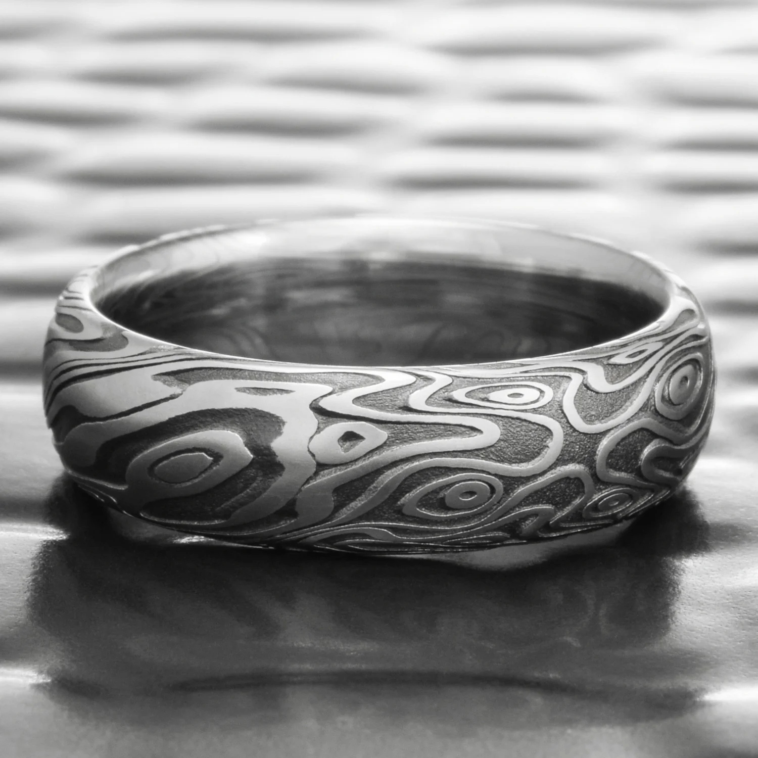 bold mens damascus ring wedding oxide steel
