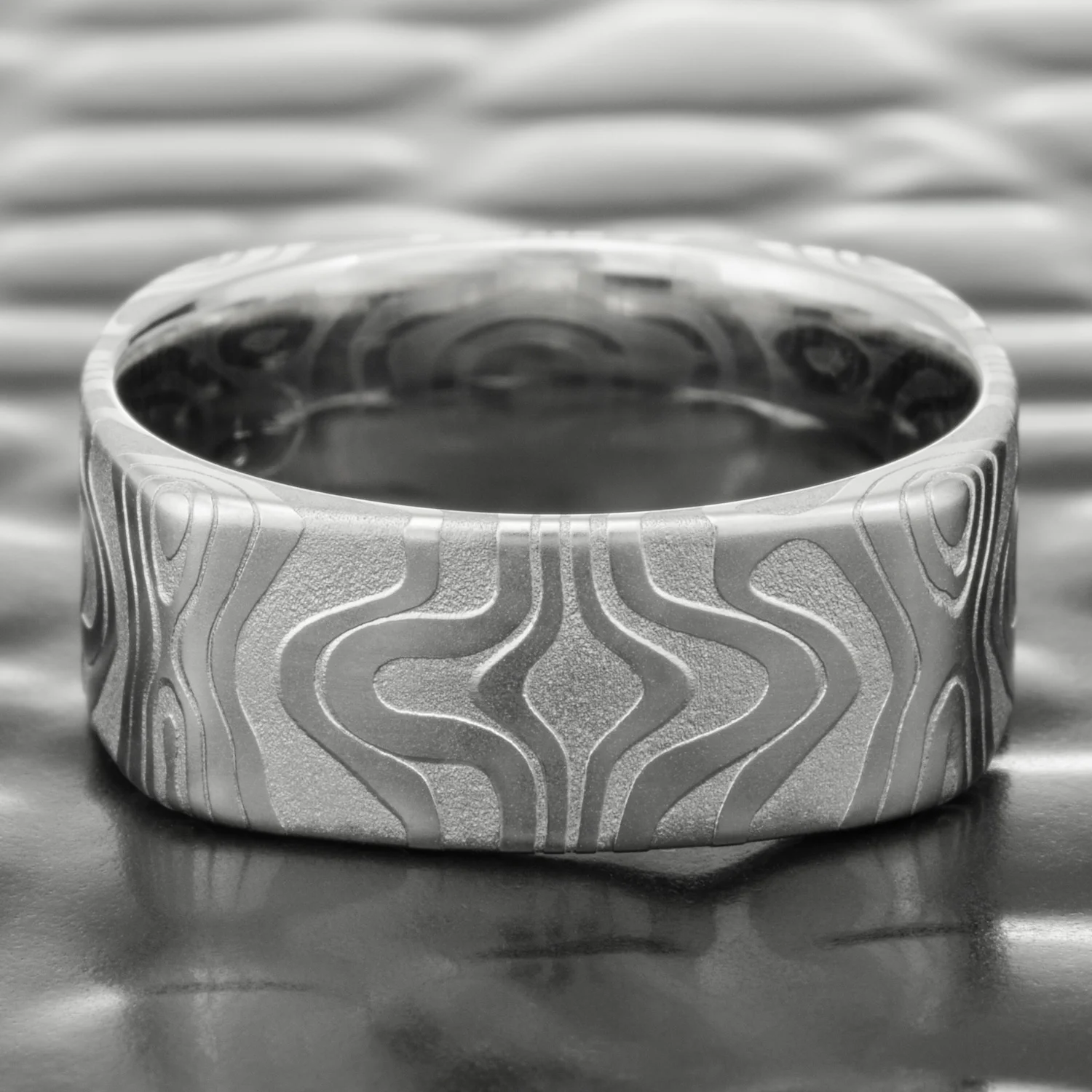 mirrored nature inspired damascus square ring