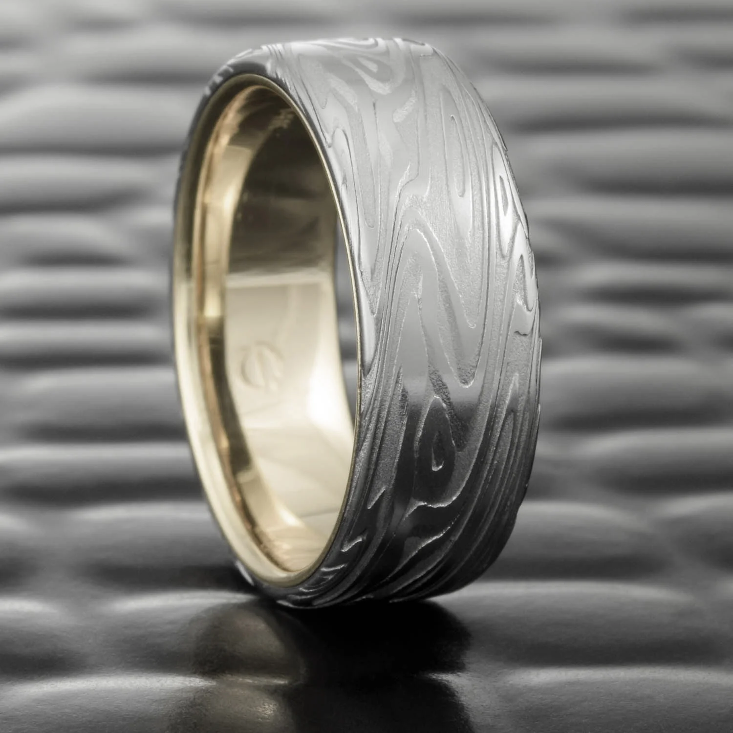 white gold lined womens subtle organic patterned wedding ring hand forged