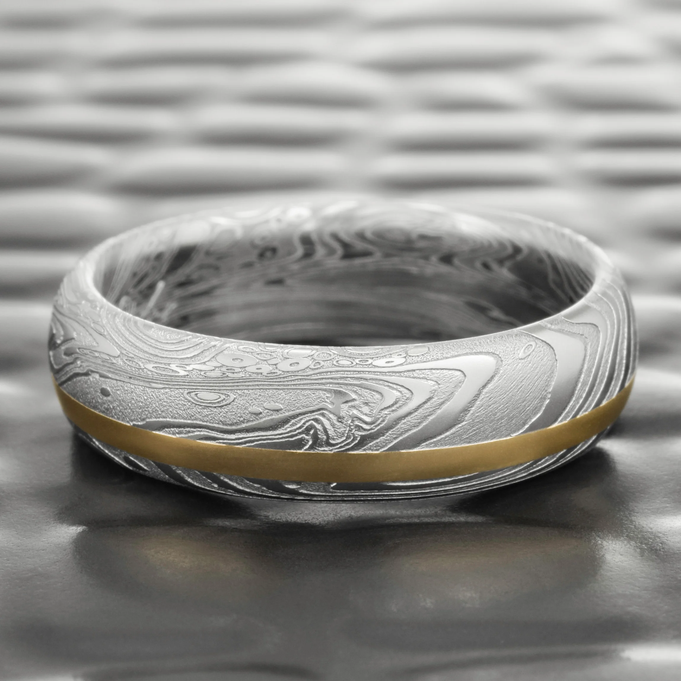 sizeable damascus stainless steel womens band gold