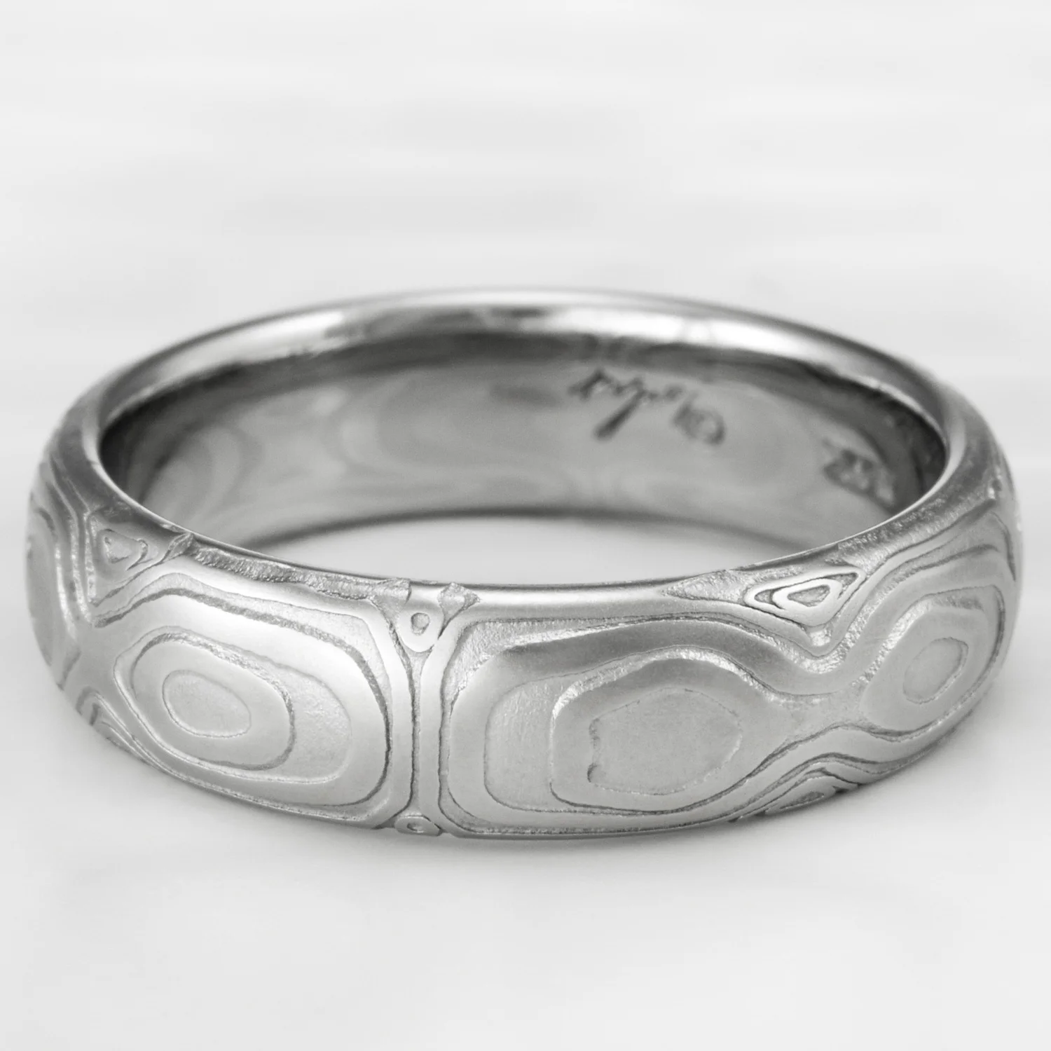 womens mirrored wedding band ring flowing wood design stainless damascus steel