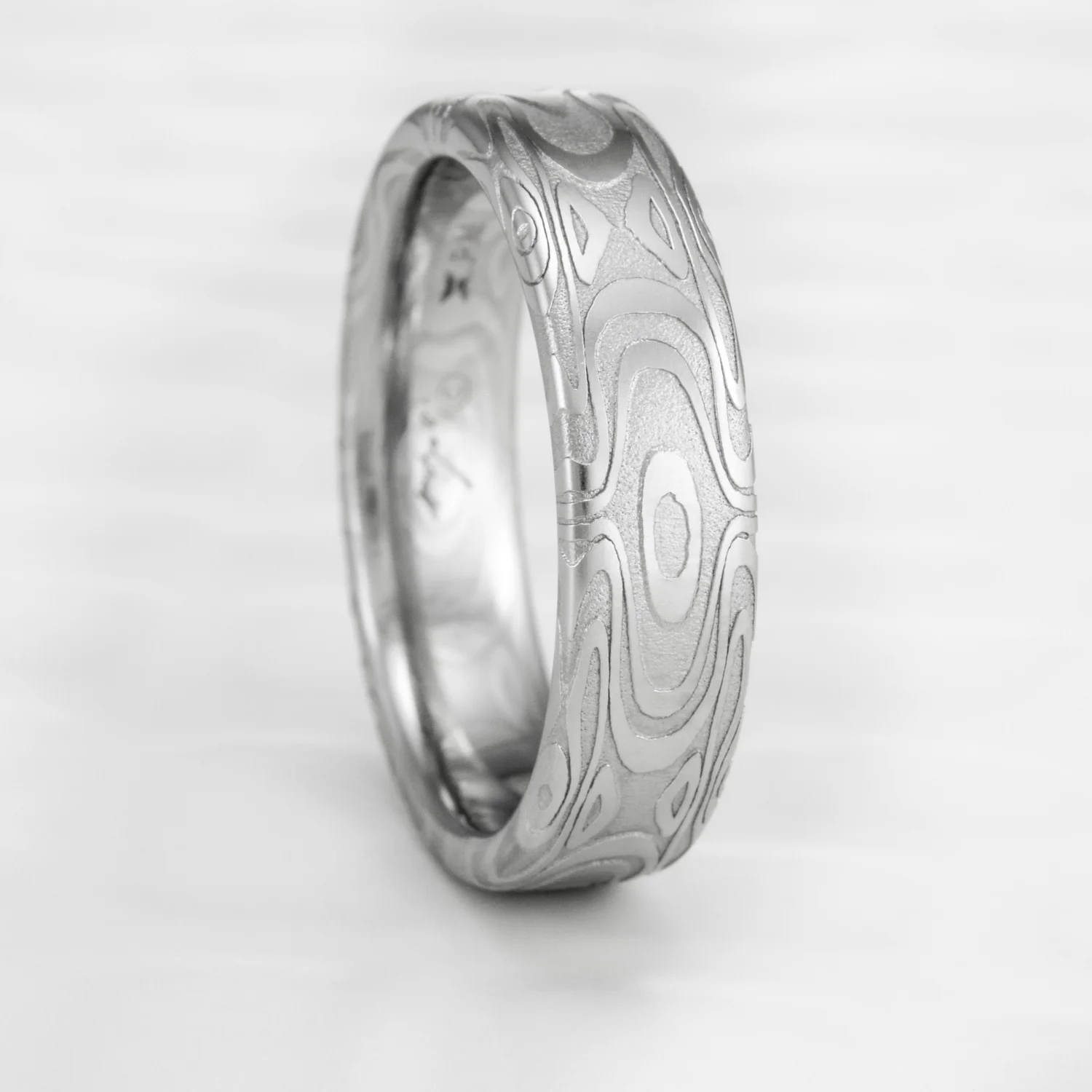 flowing wood nature inspired unique design water wood stainless steel damascus ring band womens