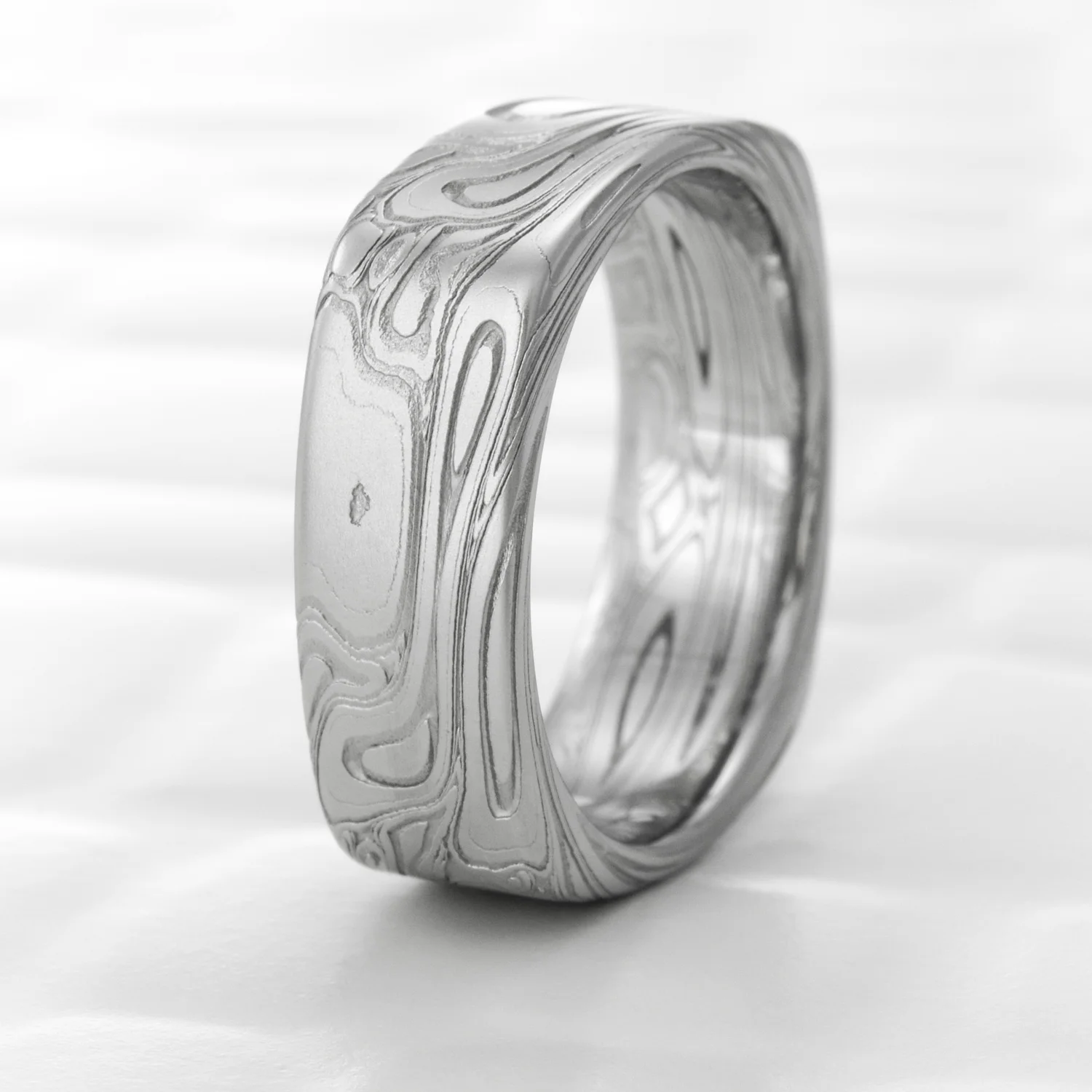 flowing design nature inspired steel legacy band womens wedding