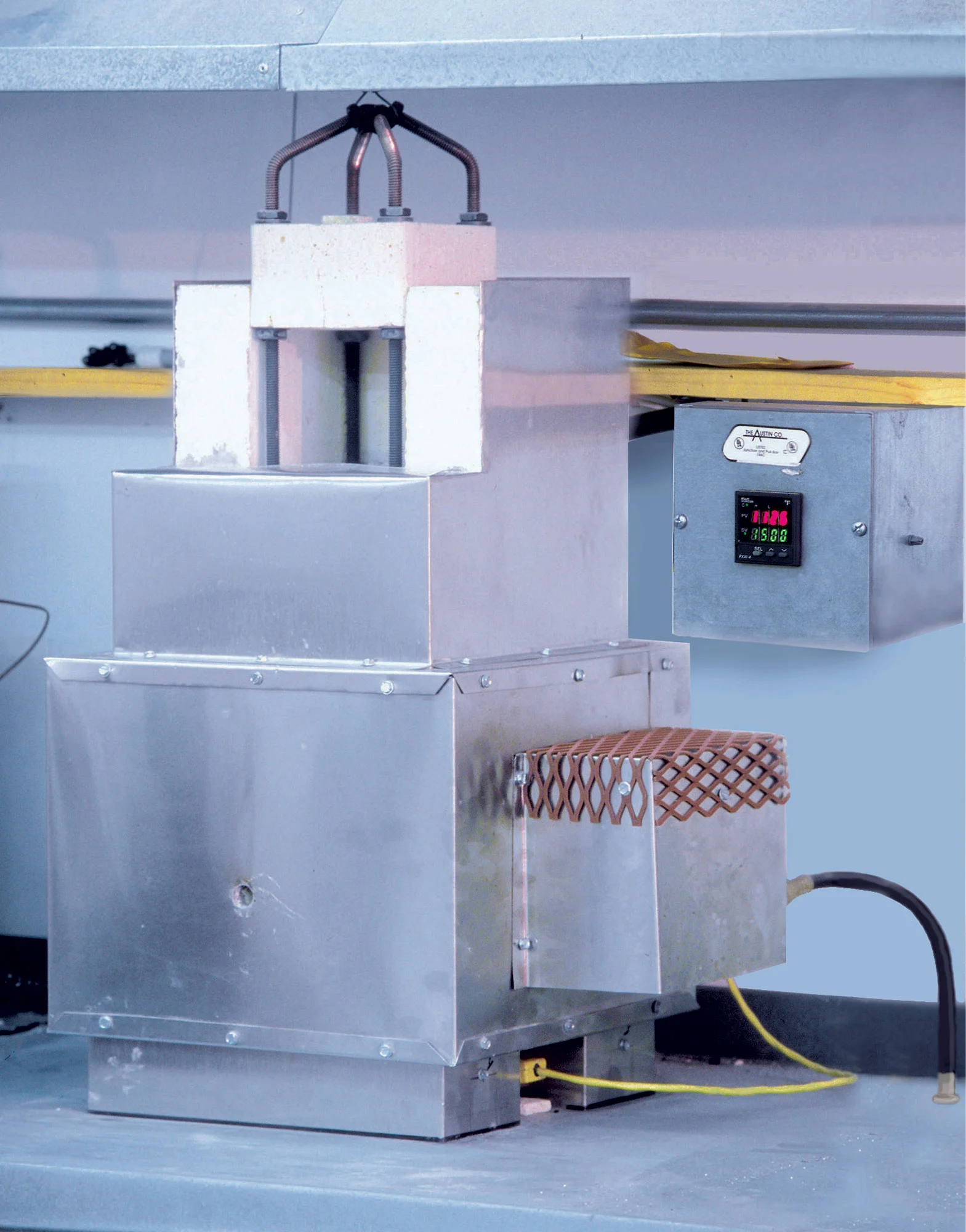 Custom made digital kiln for bonding mokume gane.