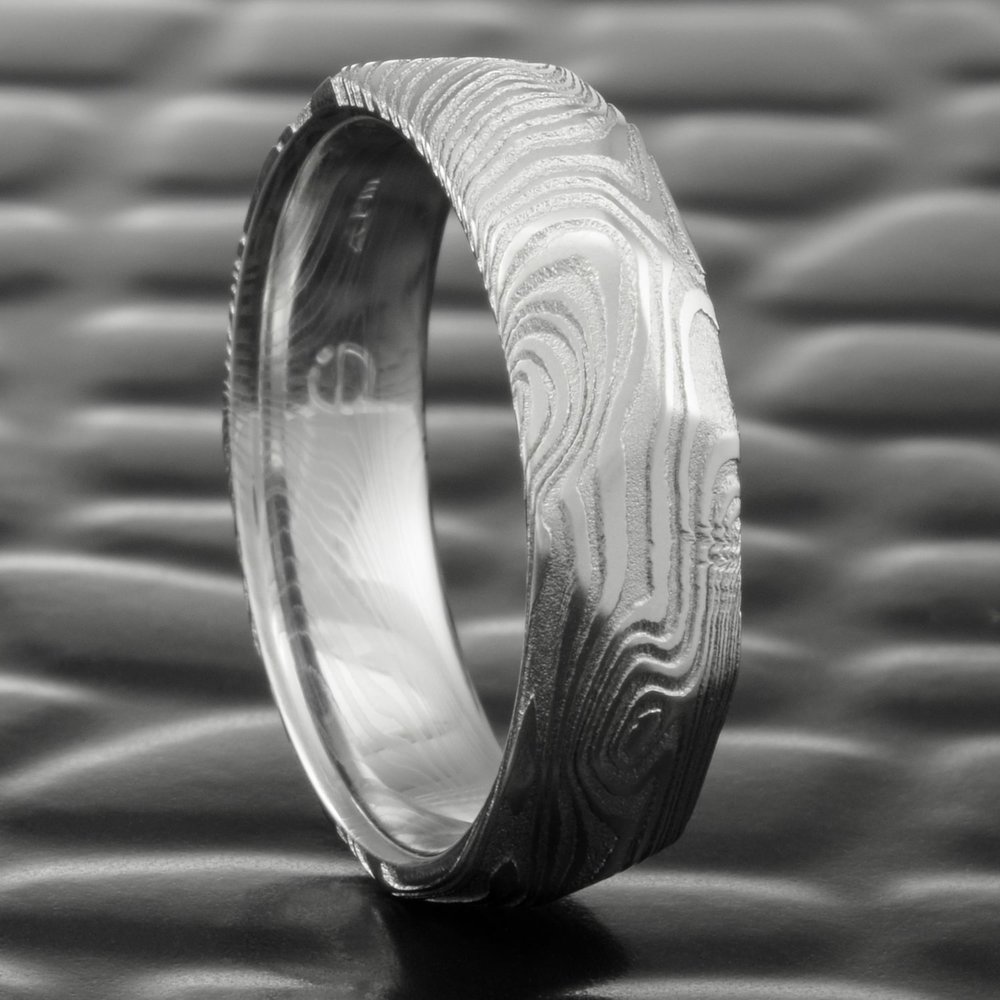 Hand Faceted Damascus Steel Ring with Woodgrain | EPIC WOOD — Steven Jacob