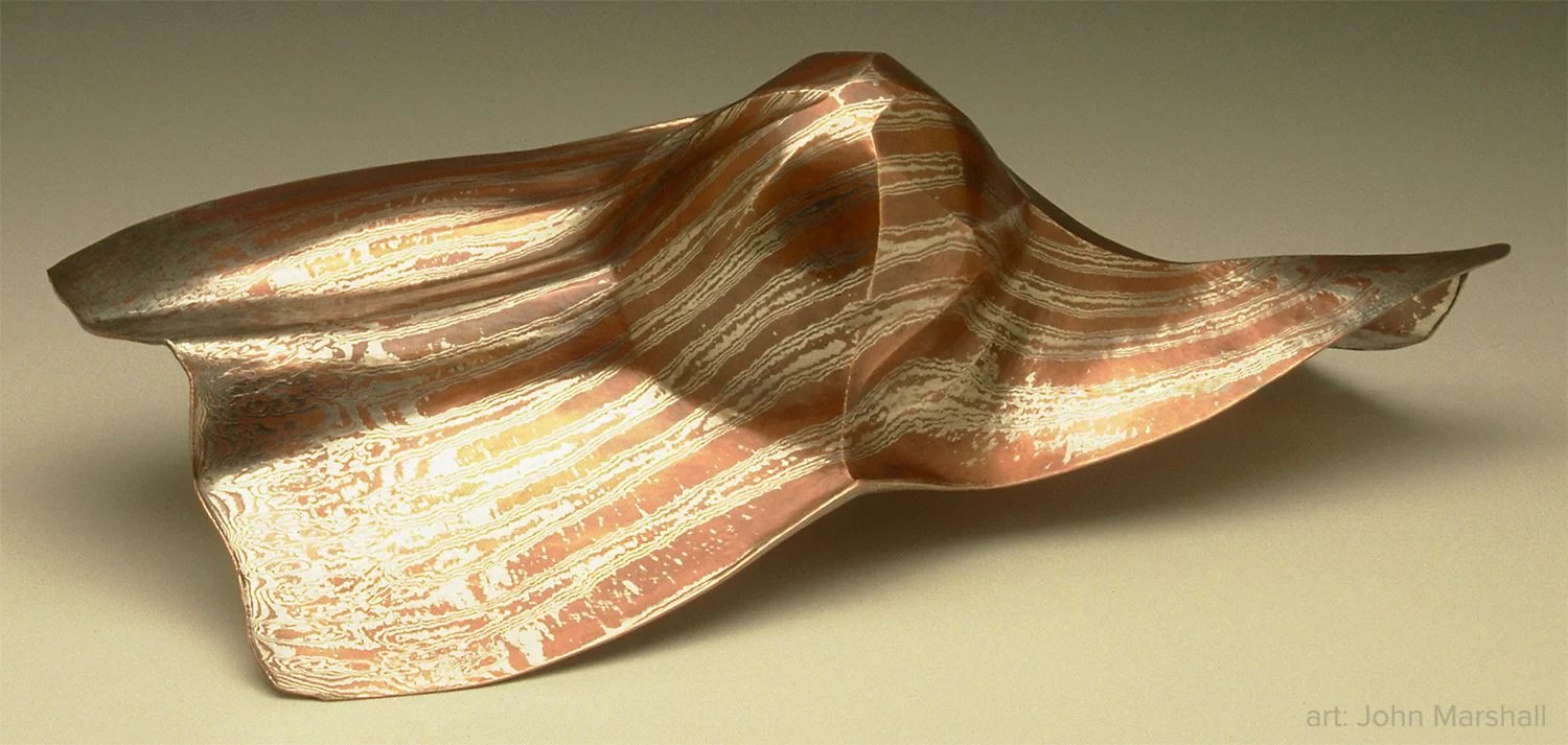 “Torque” by John Marshall. - Sterling silver and copper. Photo: Jerry Davis.