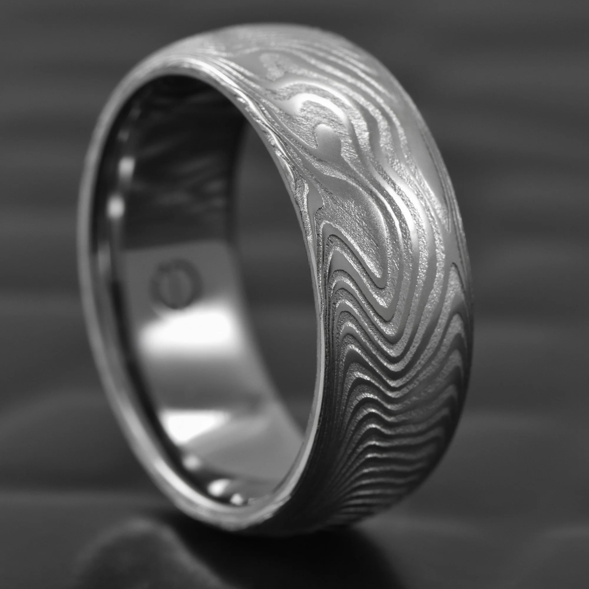 Damascus-Steel-Domed-Ring-Tantalum-Liner.jpg