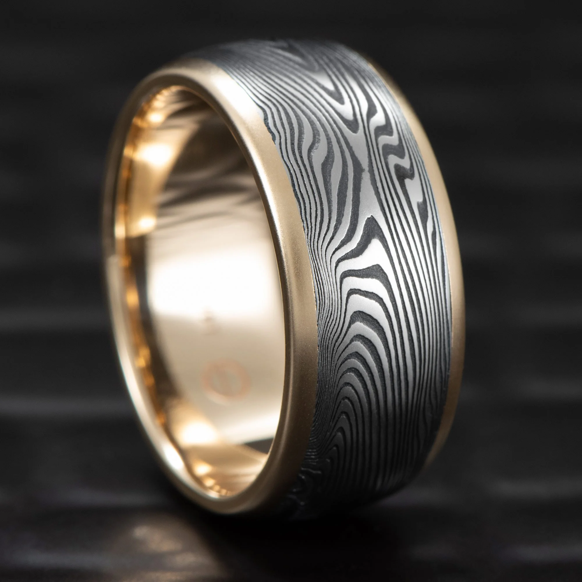 Damascus-Steel-Ring-Yellow-Gold-Rails.jpg
