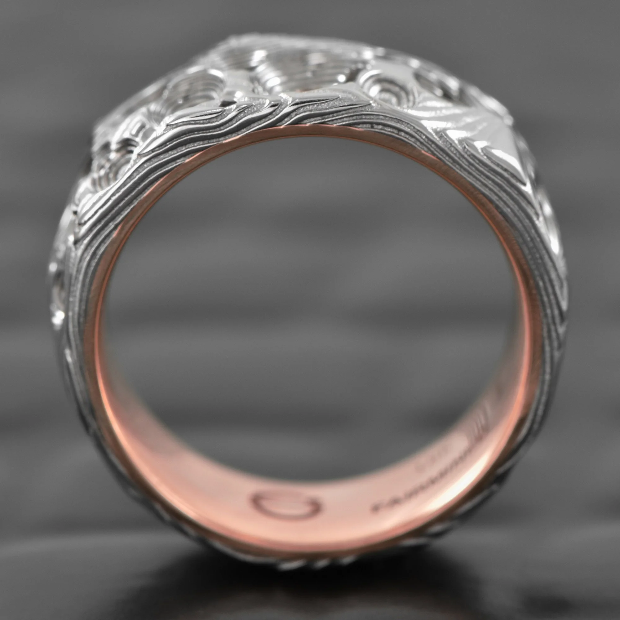 Damsacus-Steel-Ring-Carved-Crater-14K-Rose-Gold-Liner-Side-View.jpg