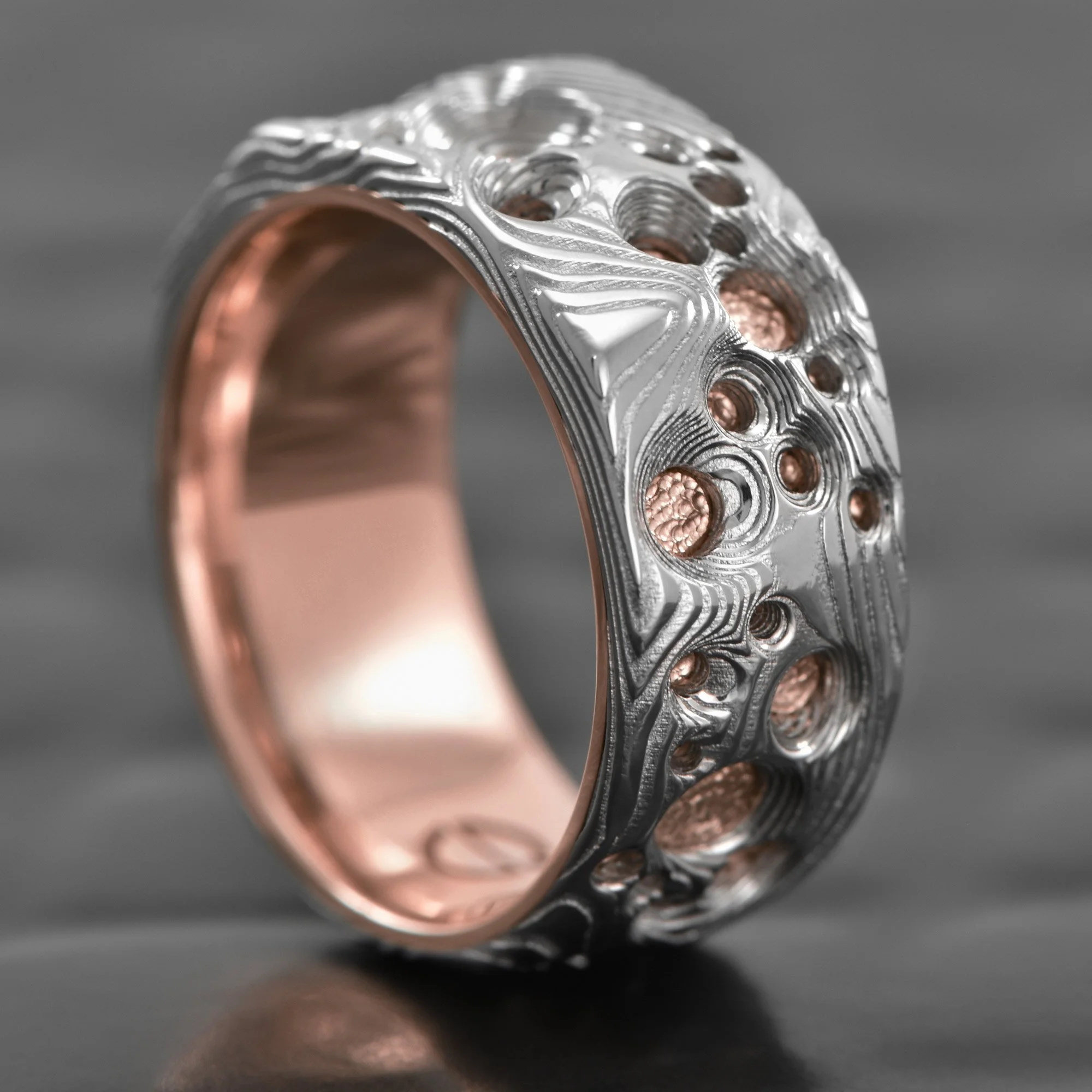 Damsacus-Steel-Ring-Carved-Crater-14K-Rose-Gold-Liner.jpg