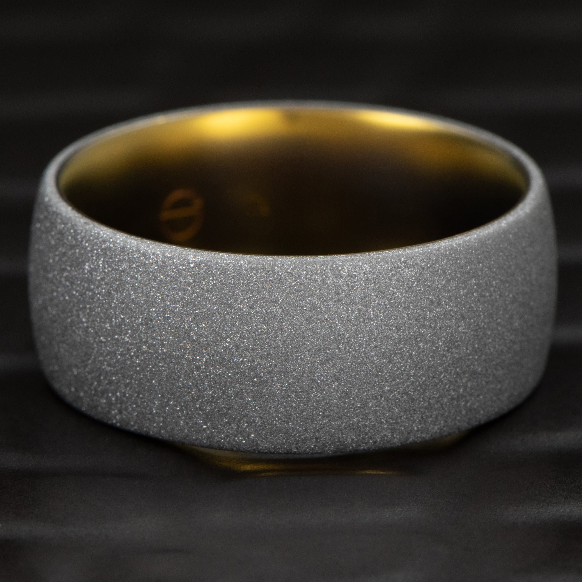 Domed-Tantalum-Ring-Yellow-Anodized-Interior-Diamond-Blasted.jpg