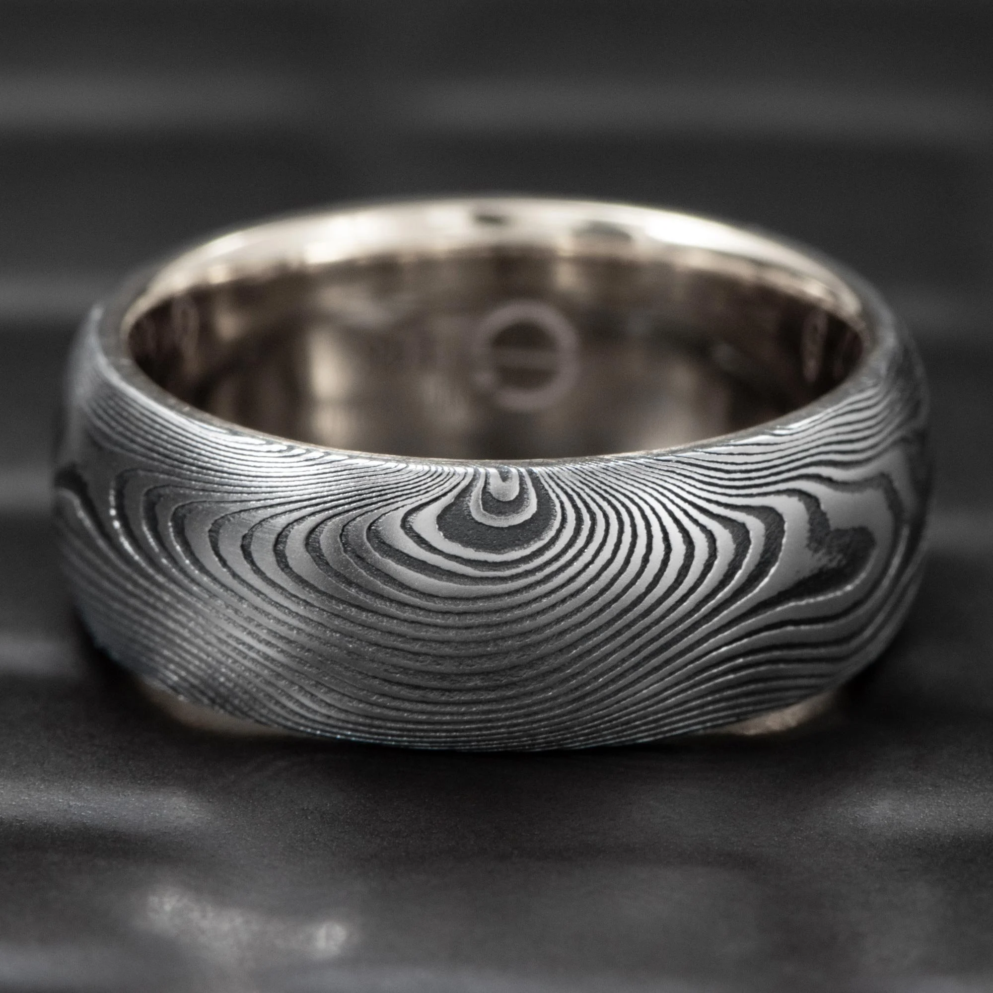 Domed-Damascus-Steel-Wedding-Band-14K-White-Gold-Sleeve.jpg