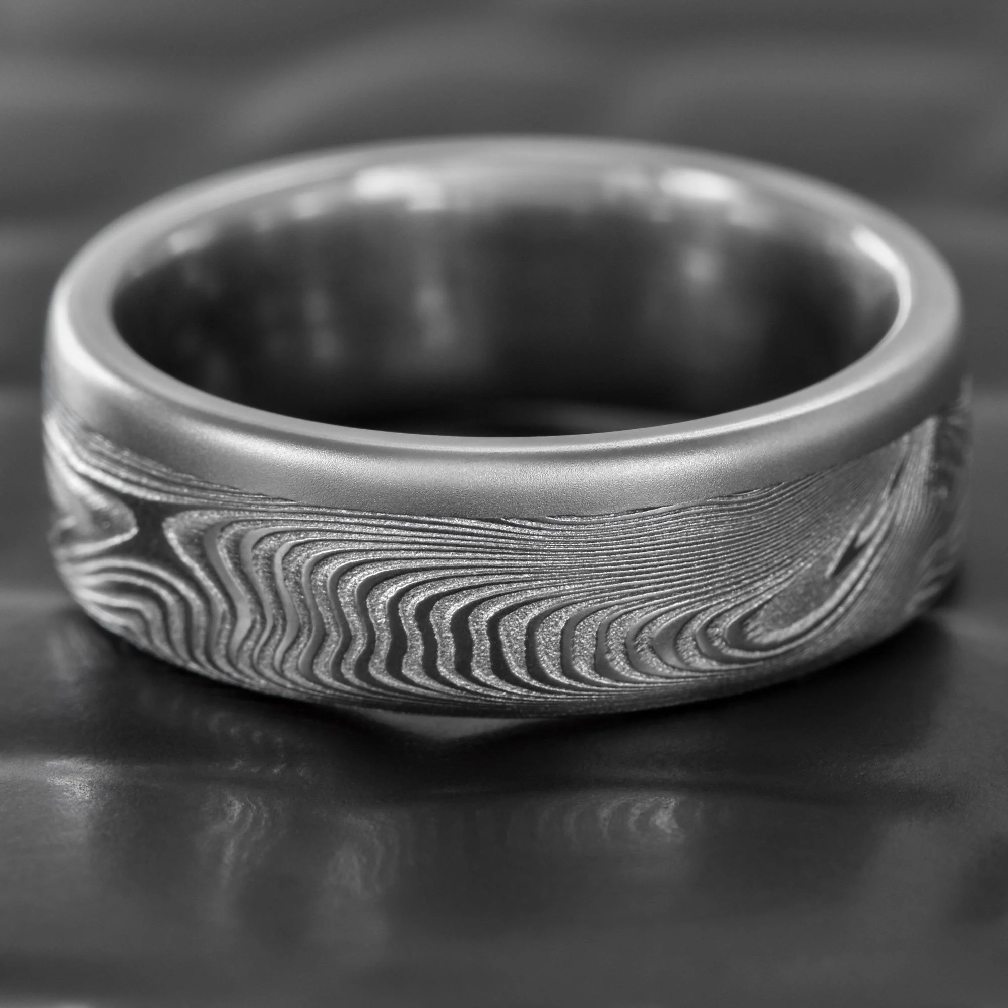 Old-Growth-Damascus-Wedding-Ring-Platinum-Rail.jpg