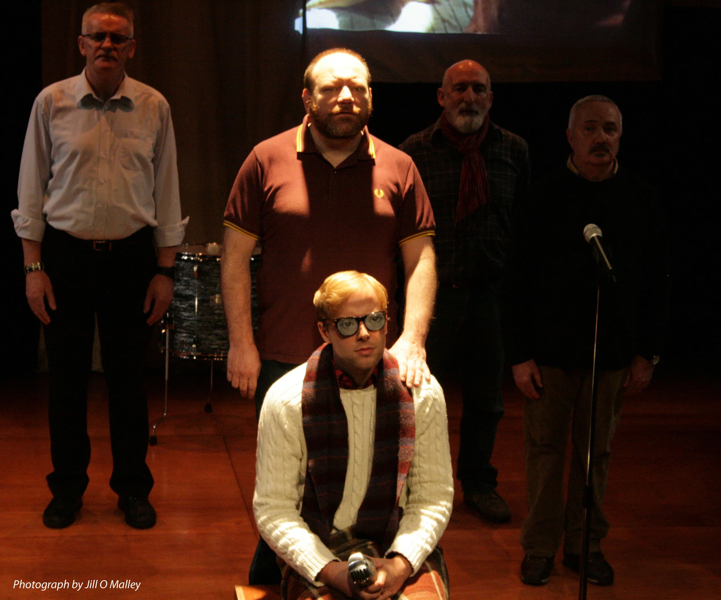 Featuring a community chorus of older and not-so-old gay men, Silver Stars is a moving and eloquent song-cycle which tells the truly remarkable real-life stories of ordinary men in search of happiness and fulfillment, in a country that was challenged by their very existence. Based on celebrated singer/songwriter Seán Millar’s interviews with gay men from Dublin to New York, these songs capture tales of love, loss, family, spirituality, defiance and joy. Photo Credit: Jill O’Malley