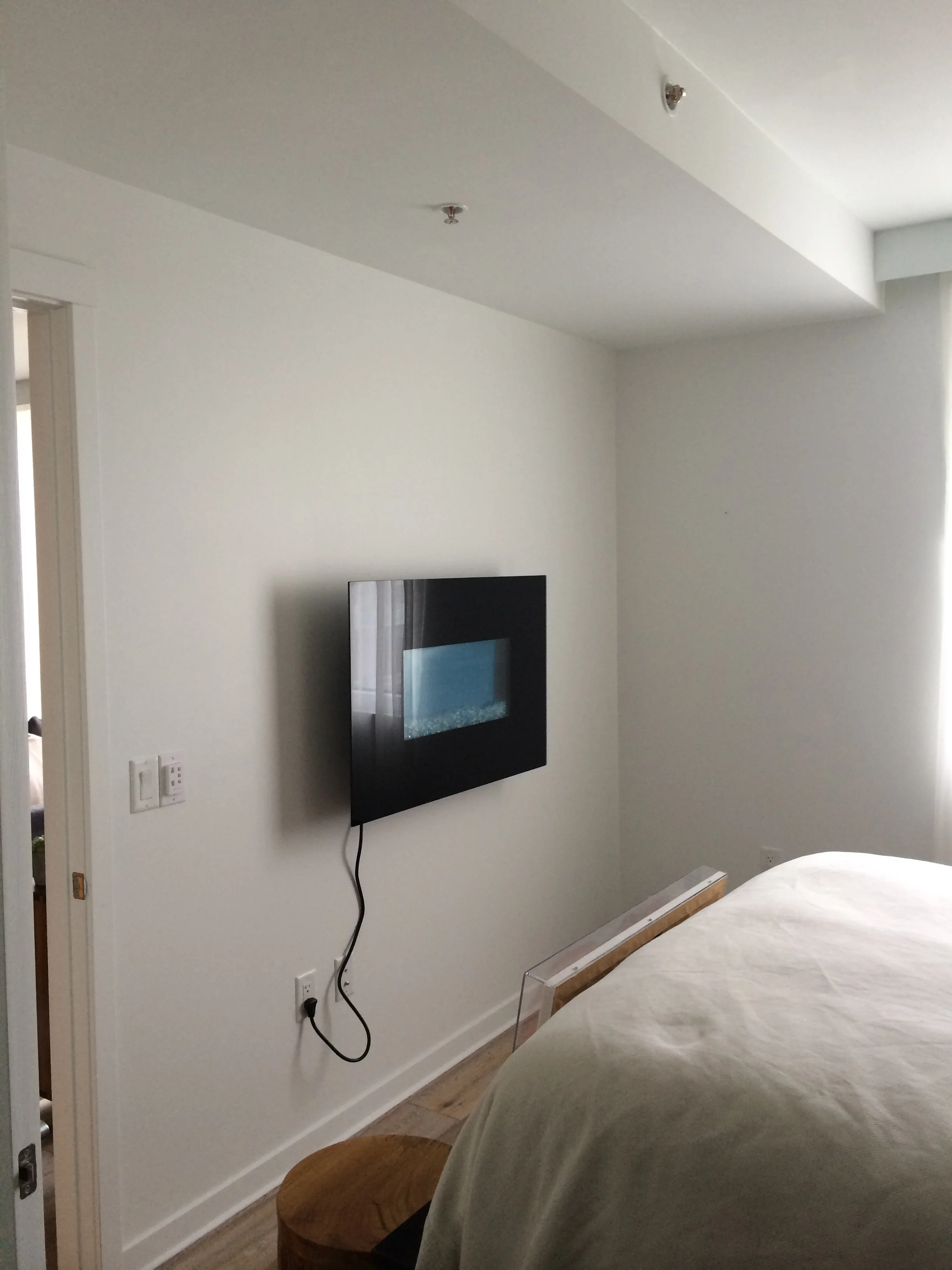 Before picture of master bedroom fireplace
