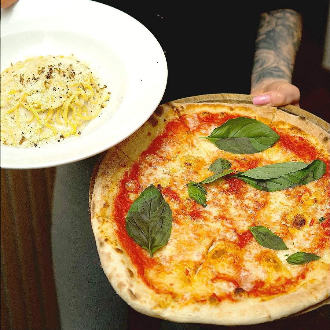 Fill your appetite with our freshly made pasta and pizzas. 

The best part is that live music is featured on Fridays and Saturdays. 

Start with a dish of tagliatelle and continue your evening singing along with us! 

Don't miss our special offers!

