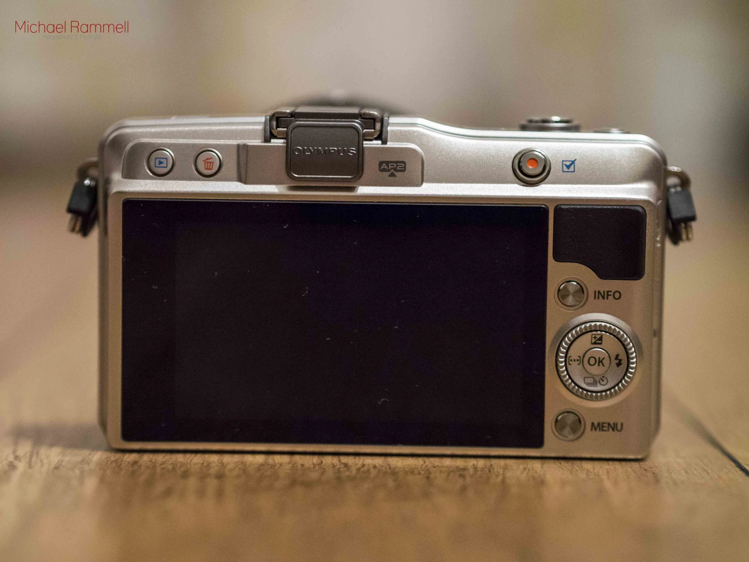 Olympus E-PM2 &nbsp;- The rear of the camera showing the 3 inch touch screen display and controls